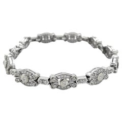 Pulsera de oro blanco de 14 quilates con eslabones ovalados de diamantes de inspiración floral