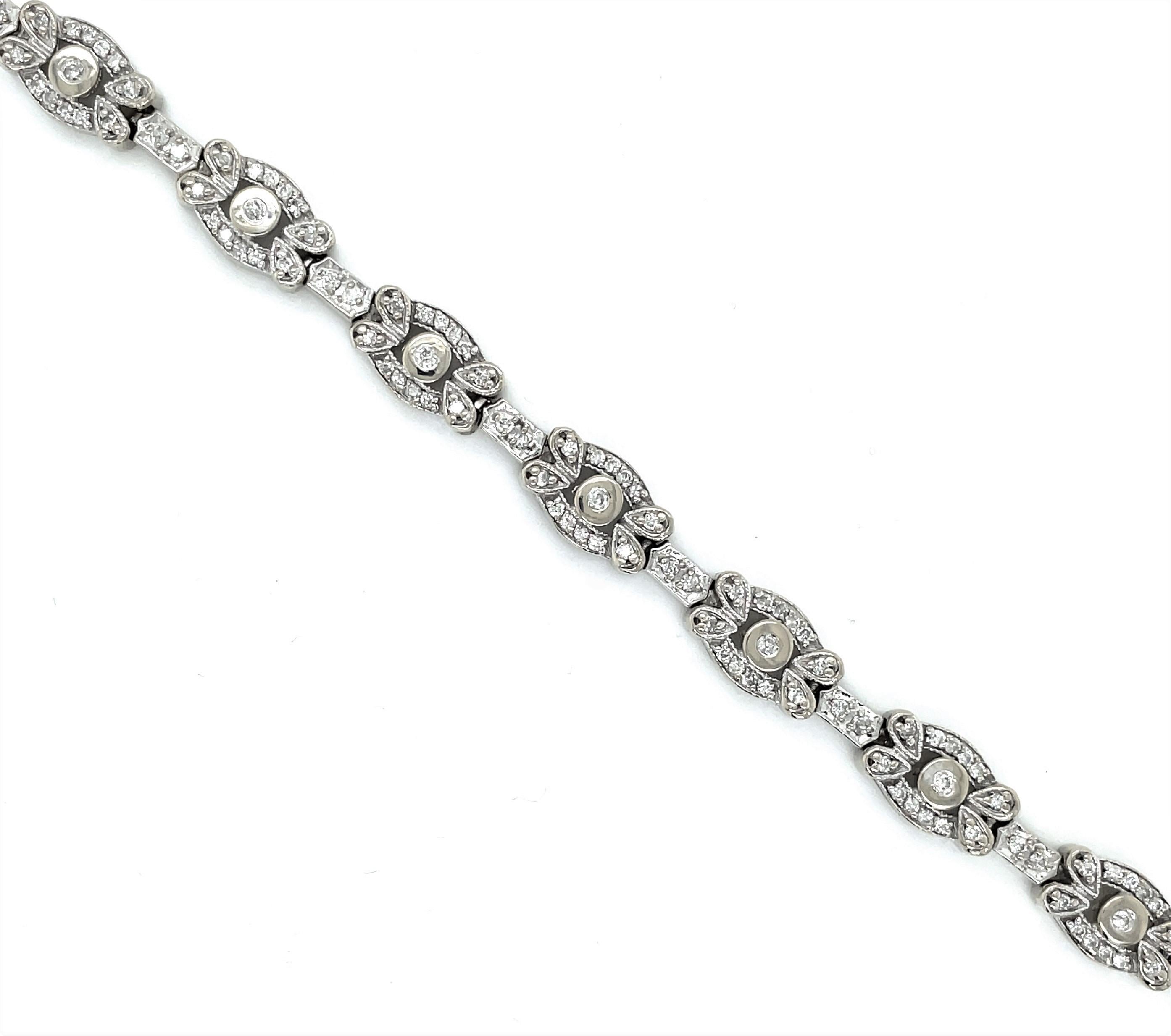 Floral Inspired Diamond Oval Link 14 Karat White Gold Bracelet In Excellent Condition For Sale In Mount Kisco, NY