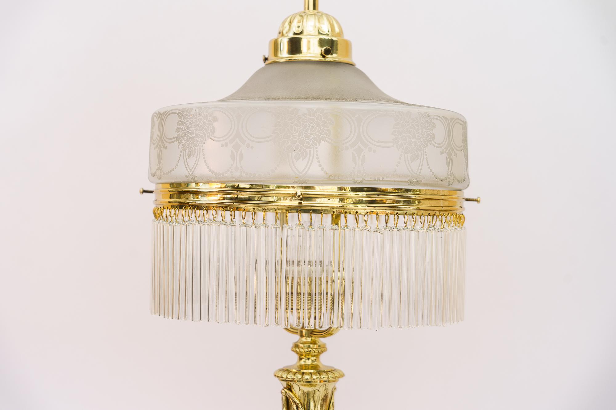 Floral jugendstil table lamp with glass shade vienna around 1908
Brass parts polished and stove enameled
Original glass shade
The glass sticks are replaced ( new ).