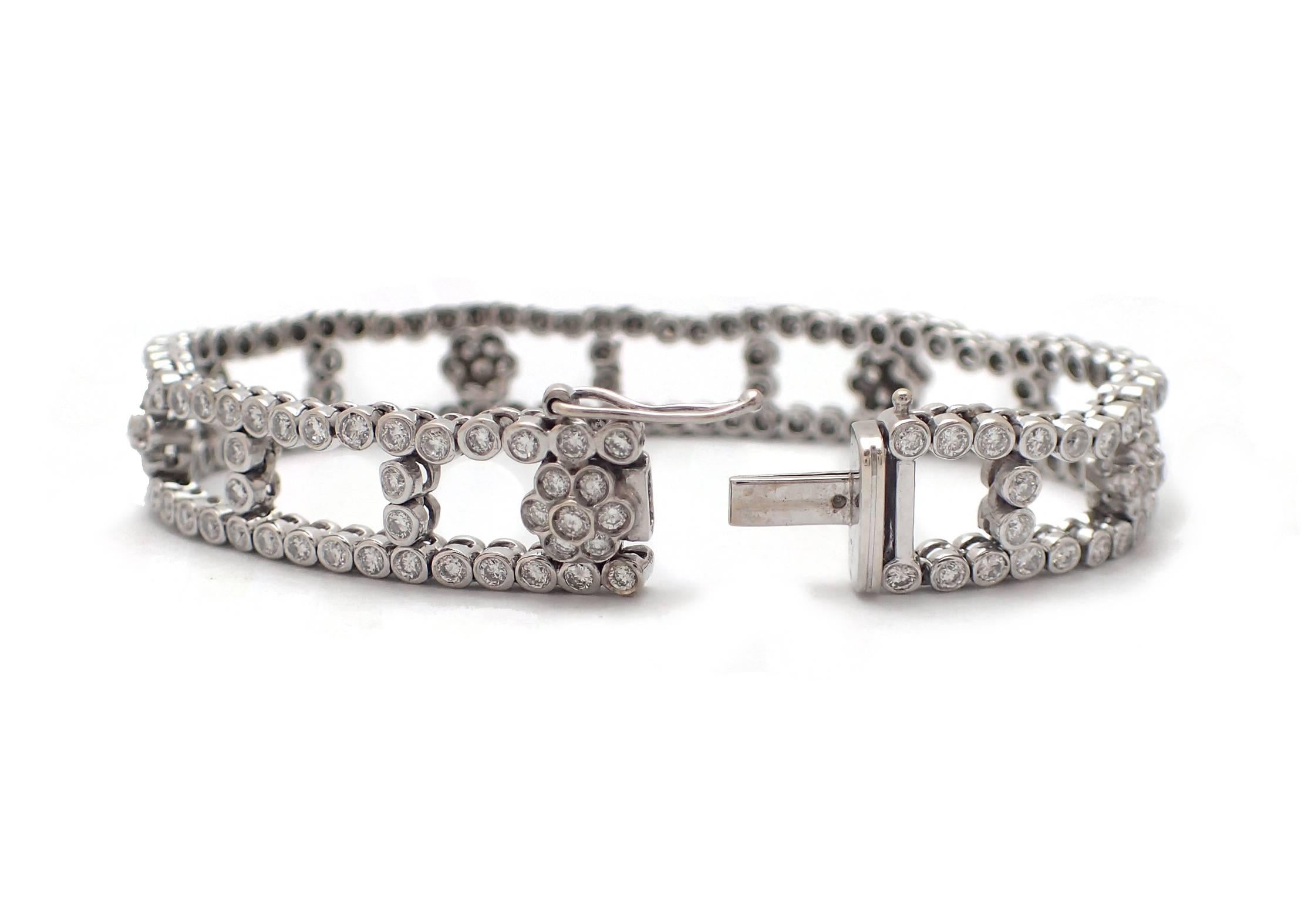Unique and stunning, this bracelet features 179 round brilliant diamonds with a total weight of 3.4CT. Bezel-set diamond flowers and bezel-set diamond 