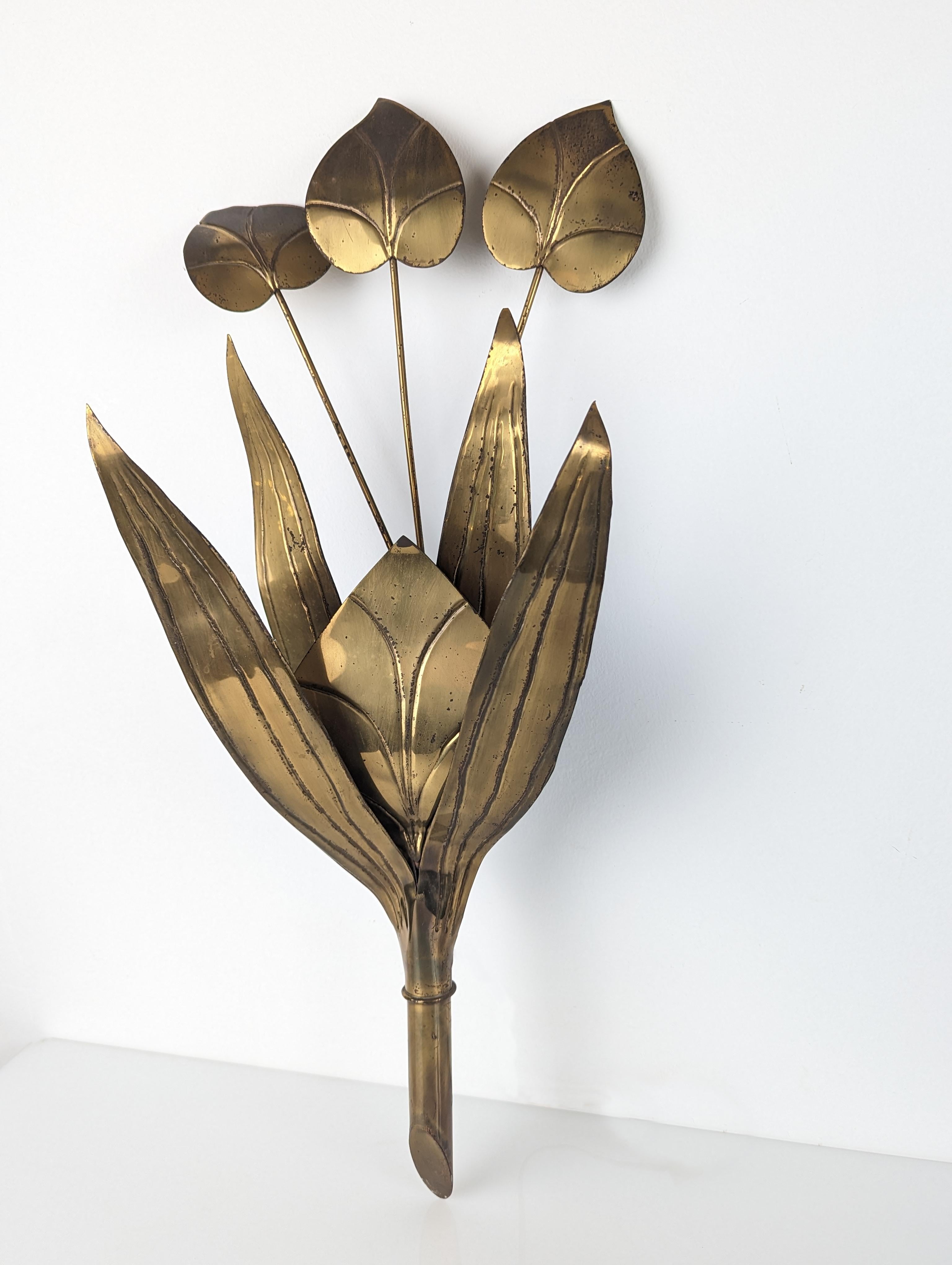 Decorative floral wall lamp with leaves the original ribbed brass from the 1960s.
