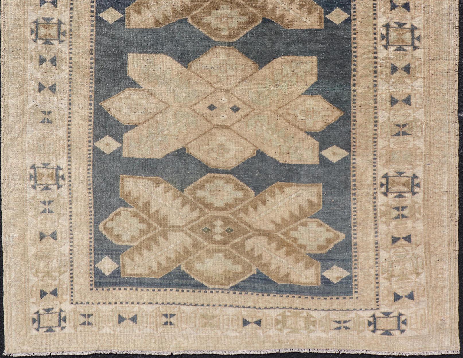 20th Century Floral Medallion Vintage Hand Knotted Turkish Oushak Rug with Geometric Border For Sale