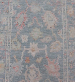 Floral Modern Oushak with Muted Blue Background in Wool  2'6 x 7'11