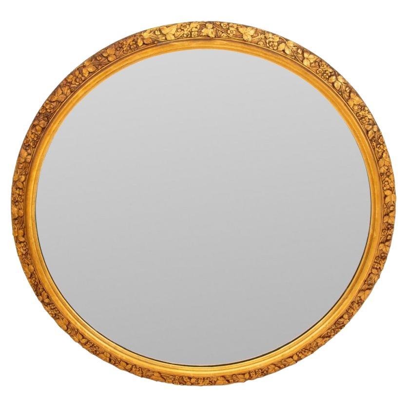 Floral Motif Carved Circular Giltwood Wall Mirror