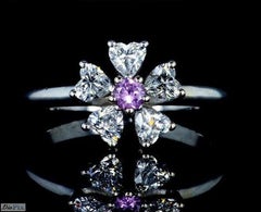 Floral Motif Diamond Ring with Ideal Cut Heart Shaped Diamonds
