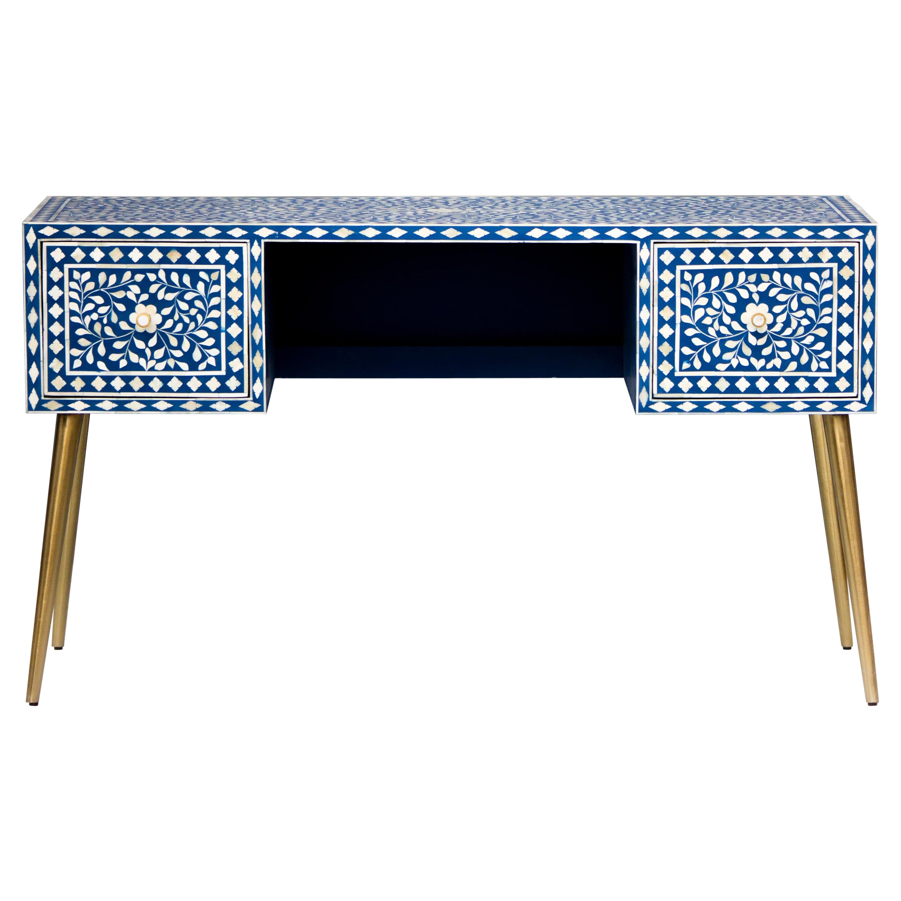 Escritorio de trabajo azul con motivos florales