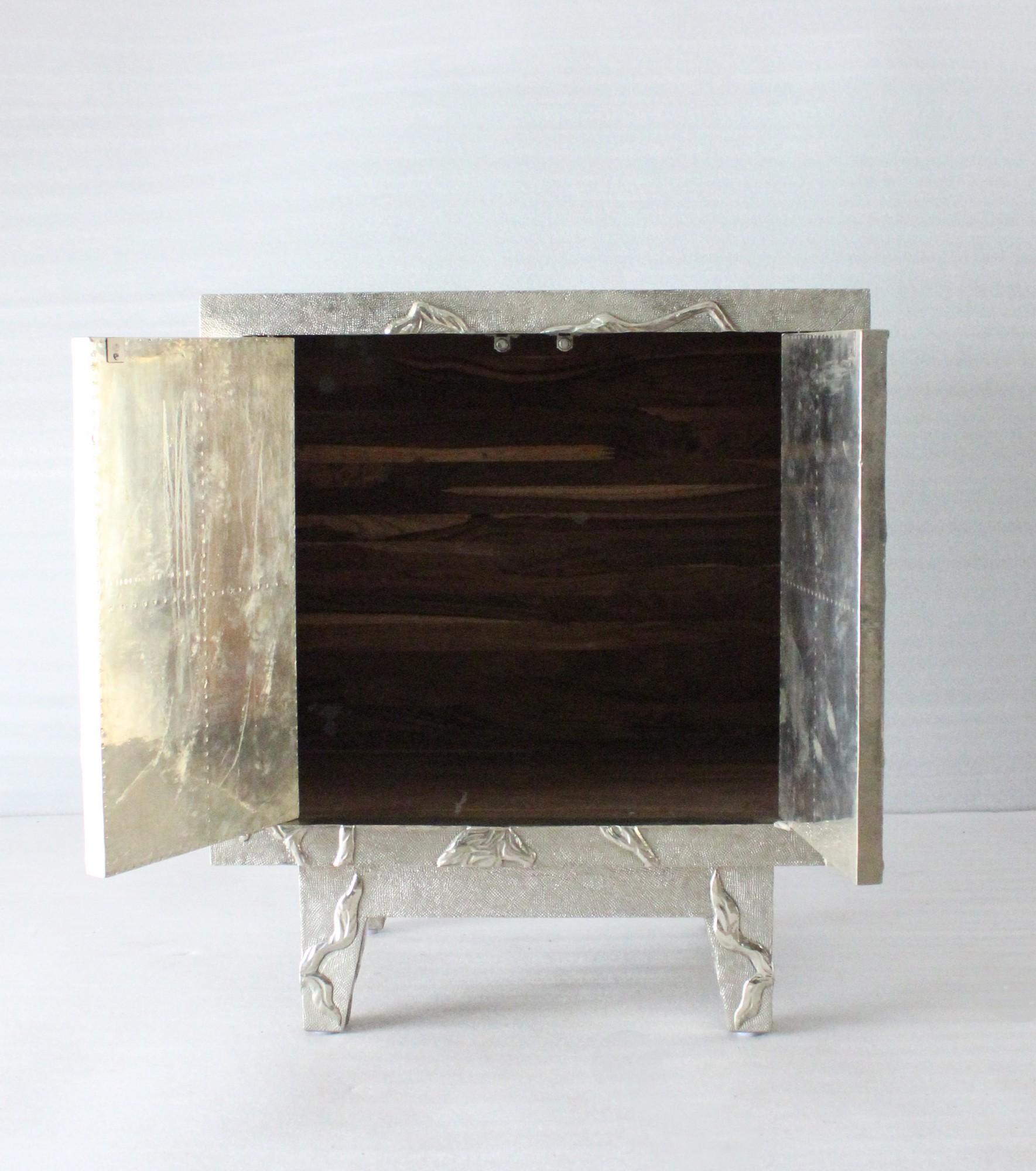 Hand-Carved Floral Nightstand in White Bronze Clad Over Teak Wood Handcrafted In India For Sale