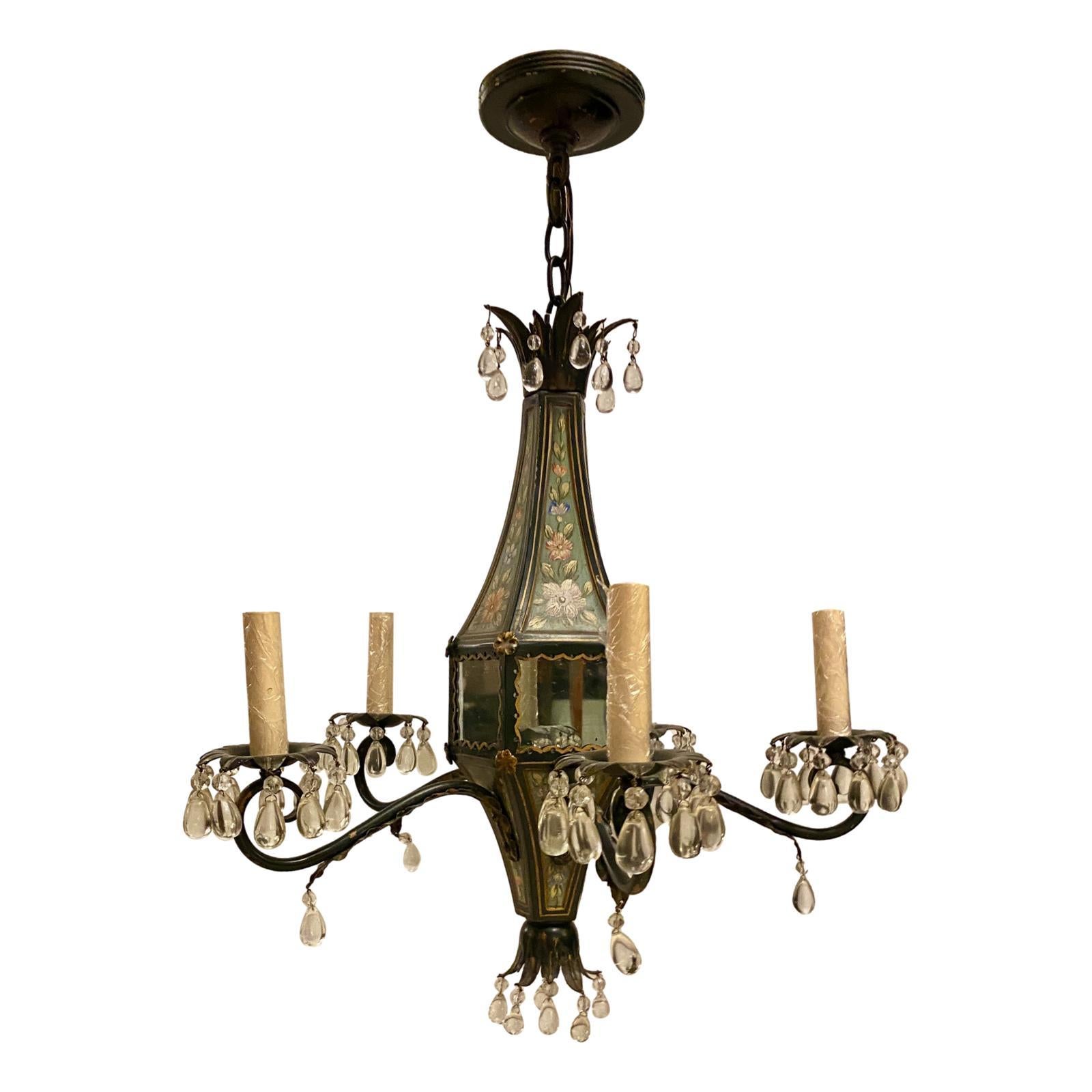 A circa 1940's French floral hand-painted tole chandelier with mirror insets on body and crystal pendants.

Measurements
Height: 22