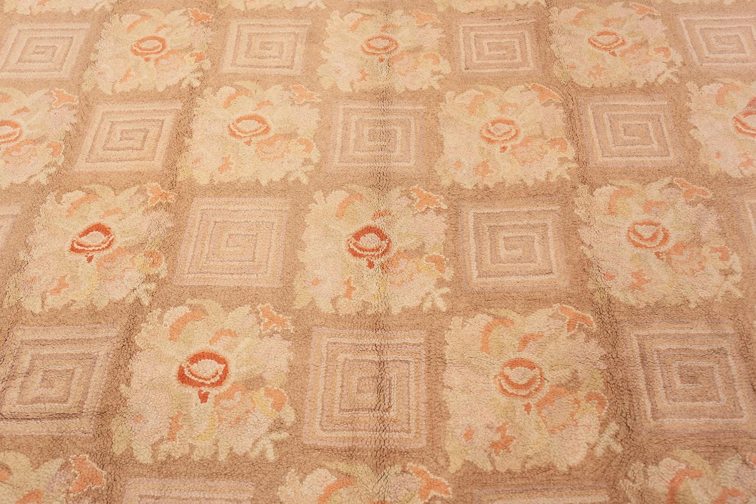 Beautiful room size floral pattern antique American Hooked rug, country of origin: America, date circa early 20th century. Size: 8 ft 9 in x 11 ft 10 in (2.67 m x 3.61 m).

