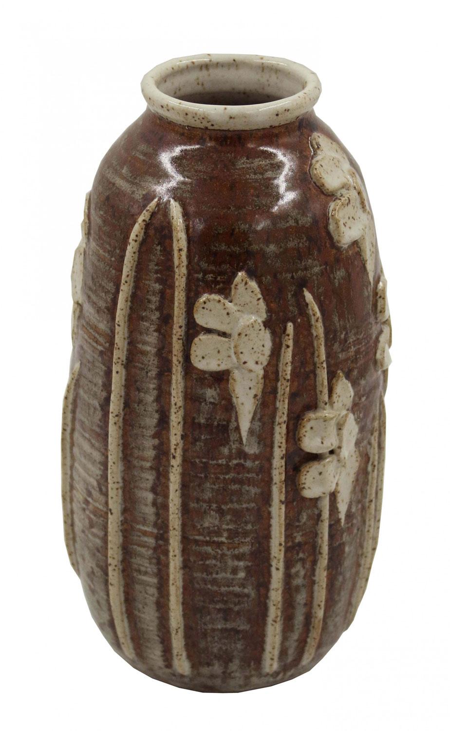 American Mid-Century earthenware vase with raised floral decor and a dark brown and beige glaze.(signed on bottom: Ecker)