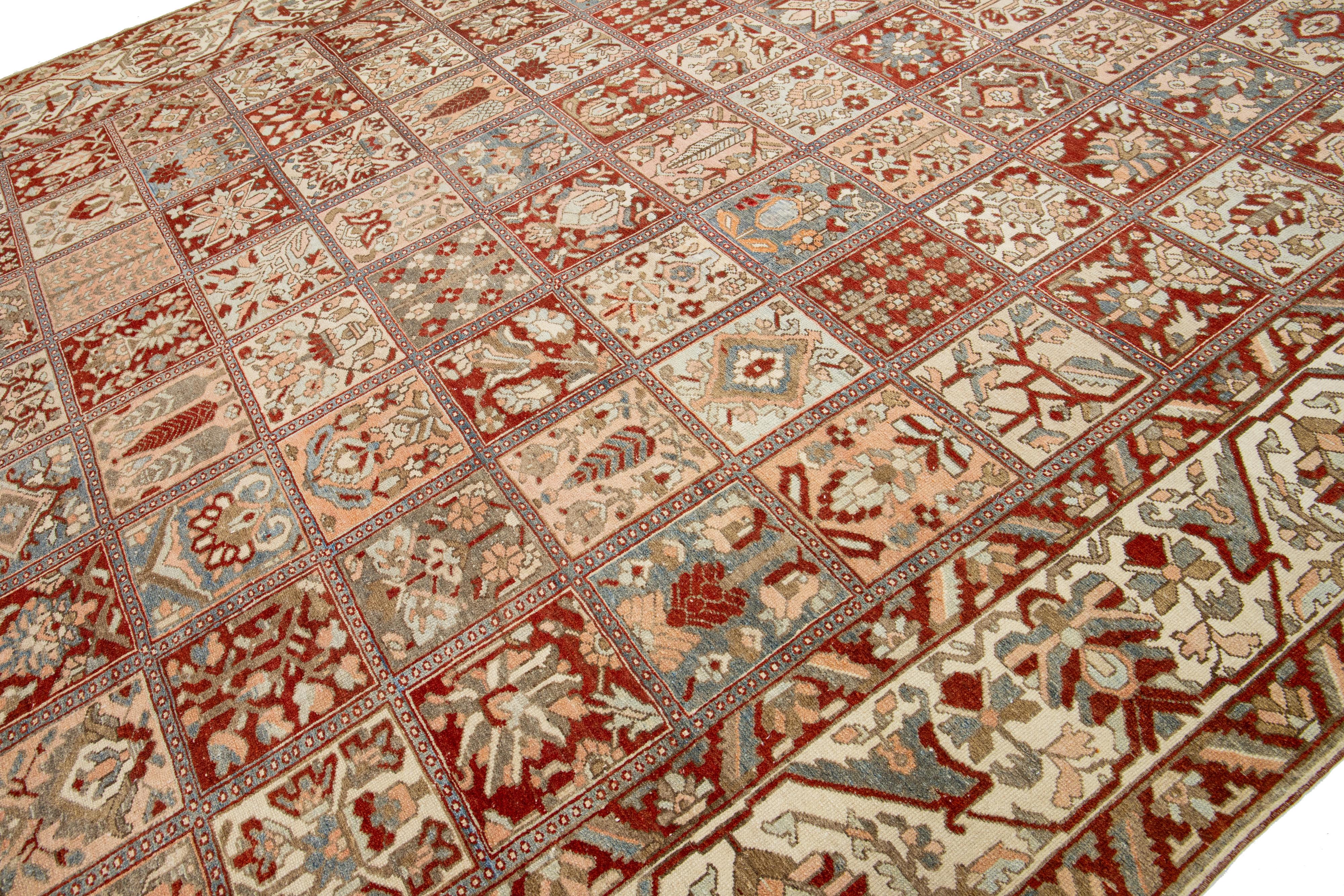 The Floral Persian Bakhtiari Rust Wool Rug Handcrafted in the 1920s (Islamisch) im Angebot