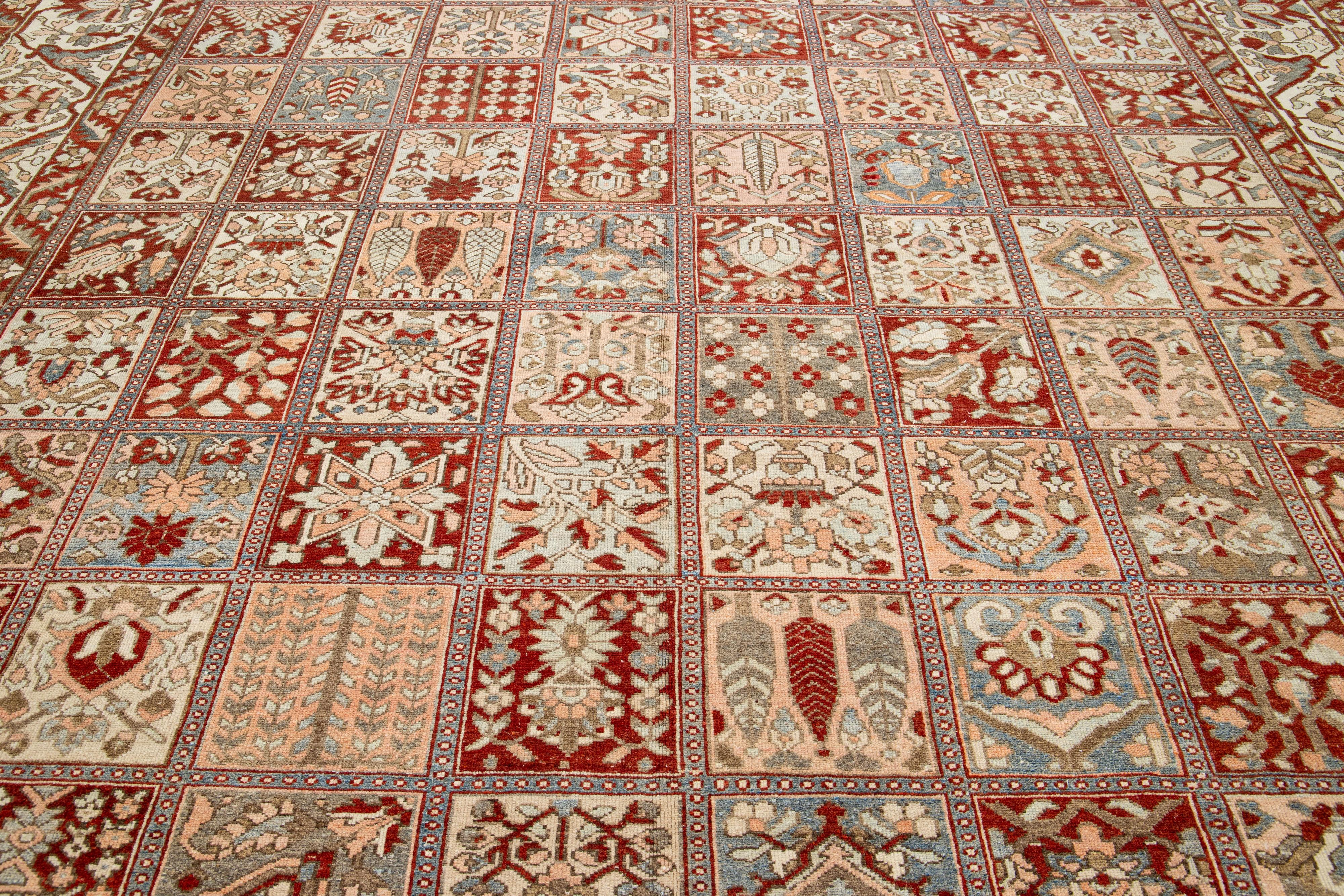 The Floral Persian Bakhtiari Rust Wool Rug Handcrafted in the 1920s im Zustand „Gut“ im Angebot in Norwalk, CT