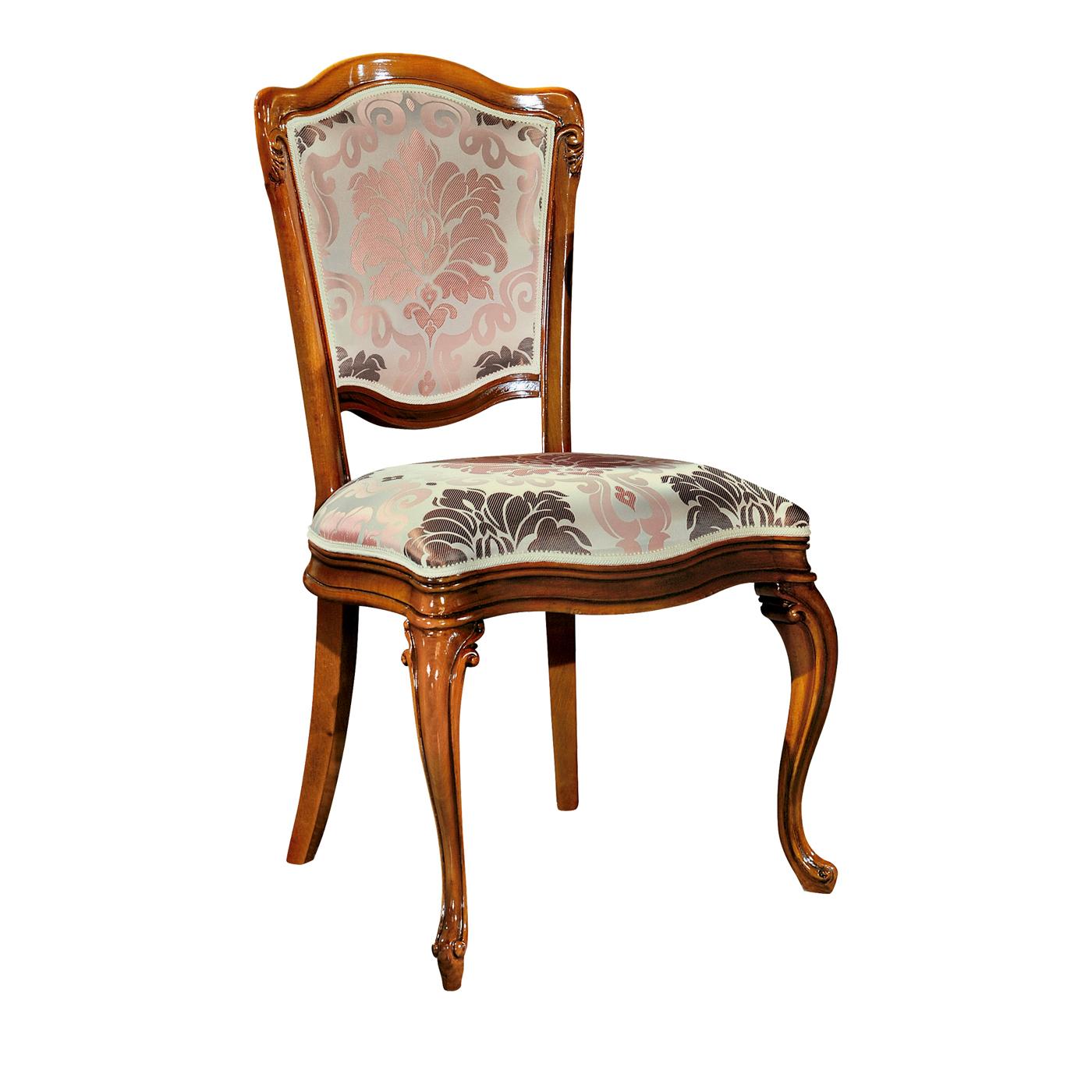 Perfect for completing the dining room, this chair from the Contemporary line has a wooden frame with the two front legs in Queen Anne style that have been finely shaped, in contrast with the two back legs in a simpler, Saber style. The seat and