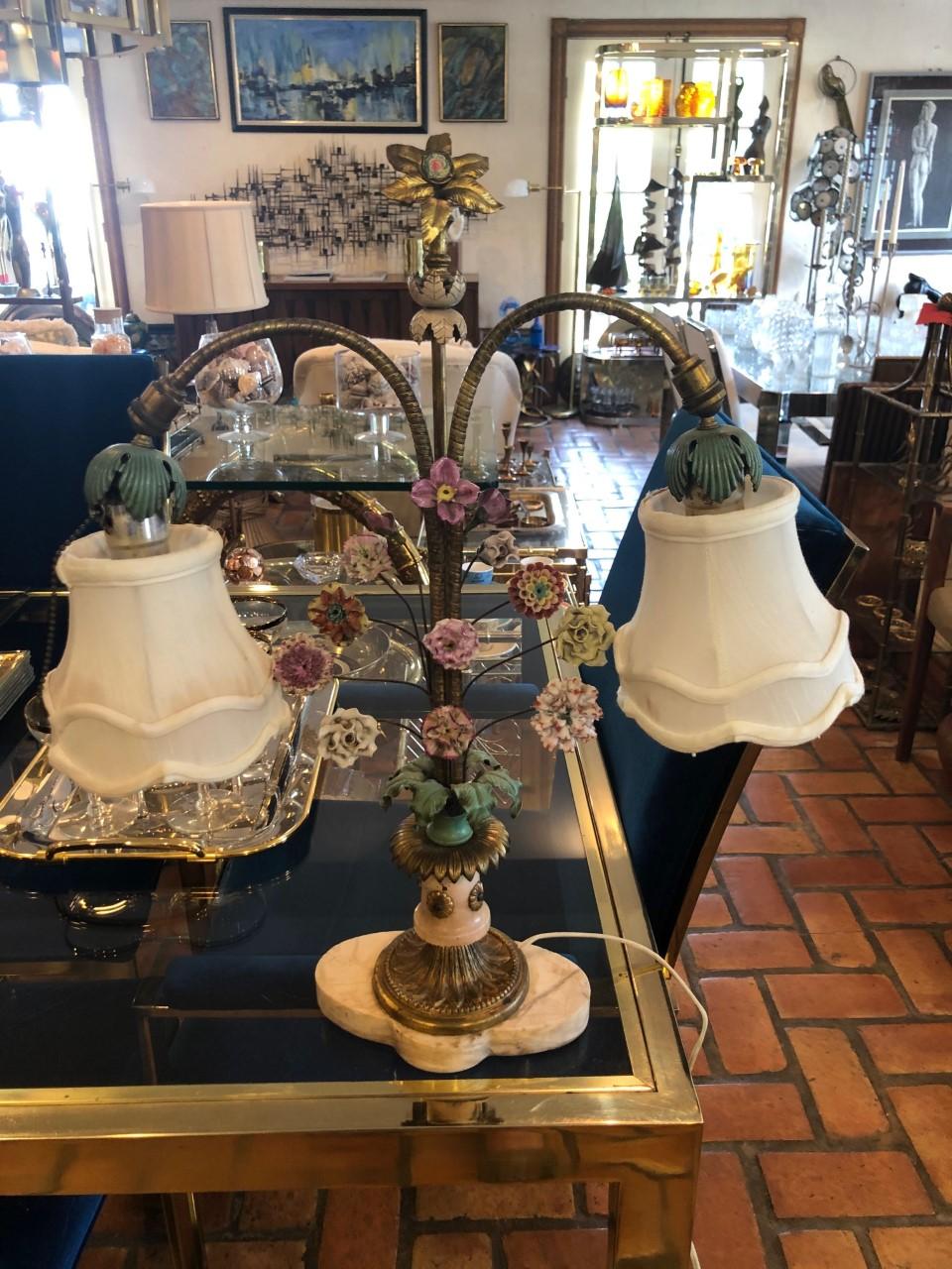 Floral porcelain table lamp. This gorgeous bouquet of a lamp will enhance any feminine boudoir.
Romantic and delicate, it sets the perfect mood lighting for any room. Wattage in photos.