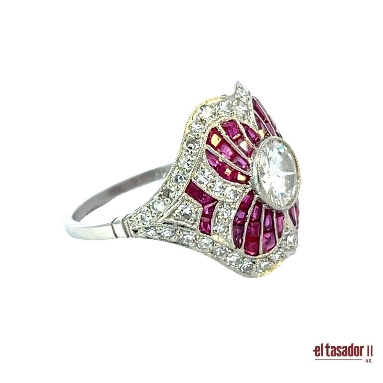 Evoking timeless elegance, this exquisite platinum floral ring is a true masterpiece of craftsmanship. At its center blooms a dazzling 1.04-carat brilliant-cut diamond, radiating exceptional fire and brilliance. Encircling the core, vivid rubies
