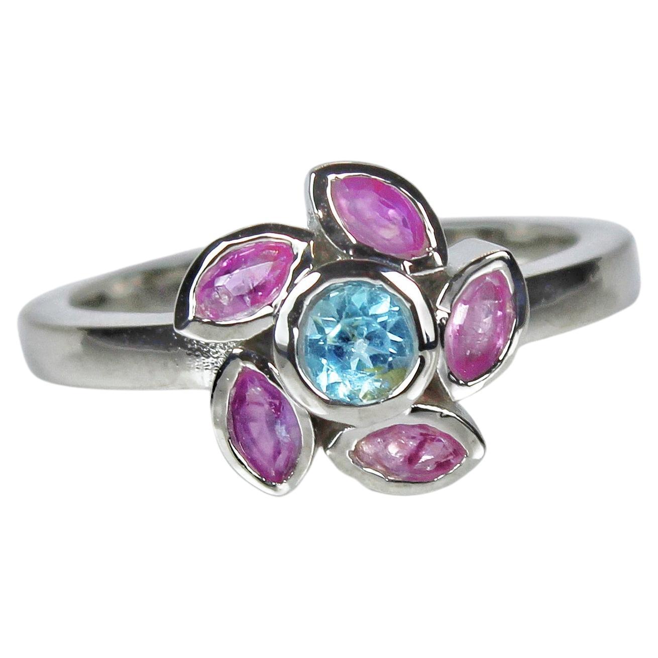 Floral Ring with Natural Pink Rubies and Blue Topaz For Sale