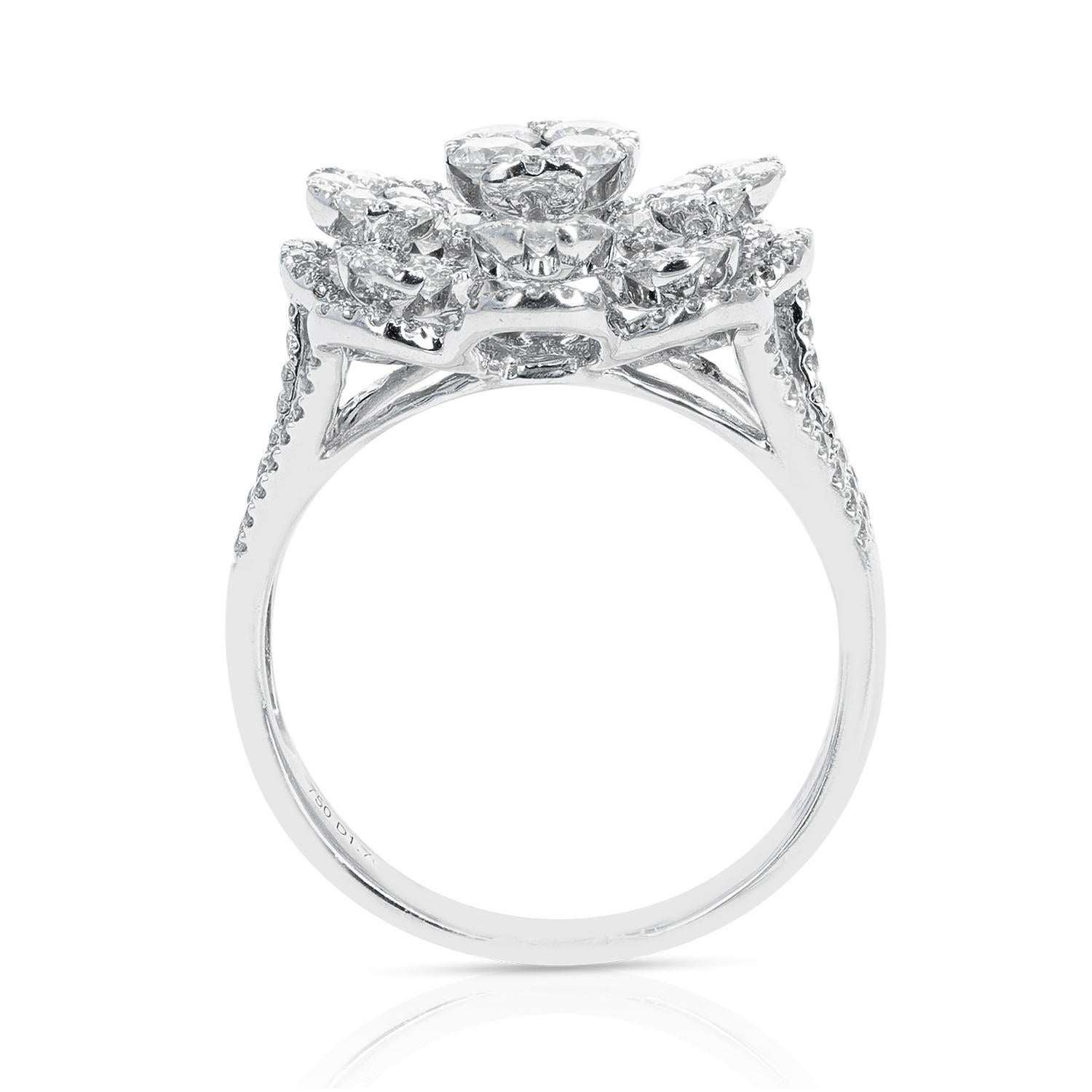 A Floral Round Diamond Cocktail Ring made in 18 Karat White Gold. The Diamonds weigh 1.70 carats, the color is approximately G/H, and the clarity is VS. Ring Size US 6.50. The total weight is 6.58 grams. 
 
 