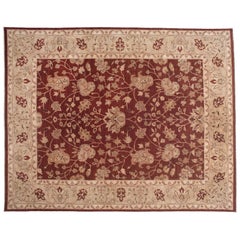 Tapis à fleurs rouge et beige 