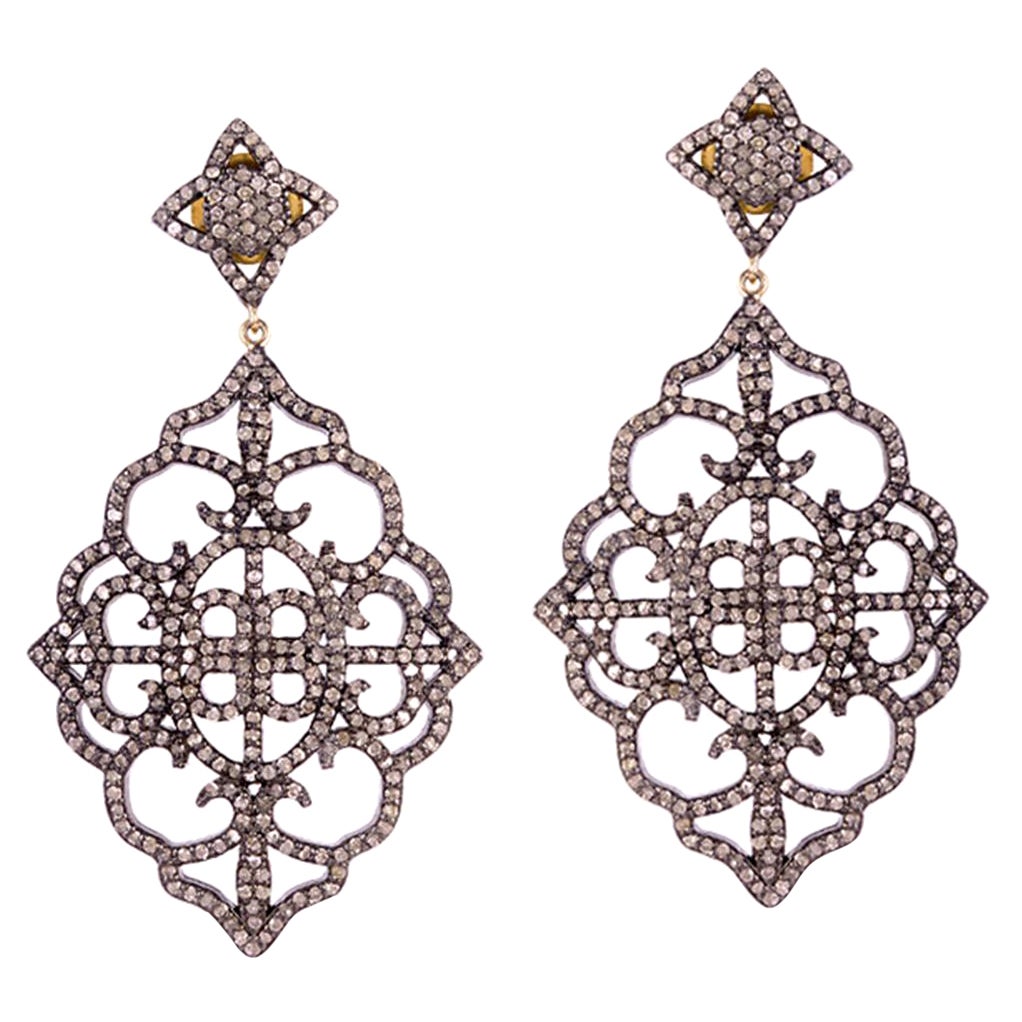 Pendants d'oreilles en or et argent avec diamants pavés de forme florale