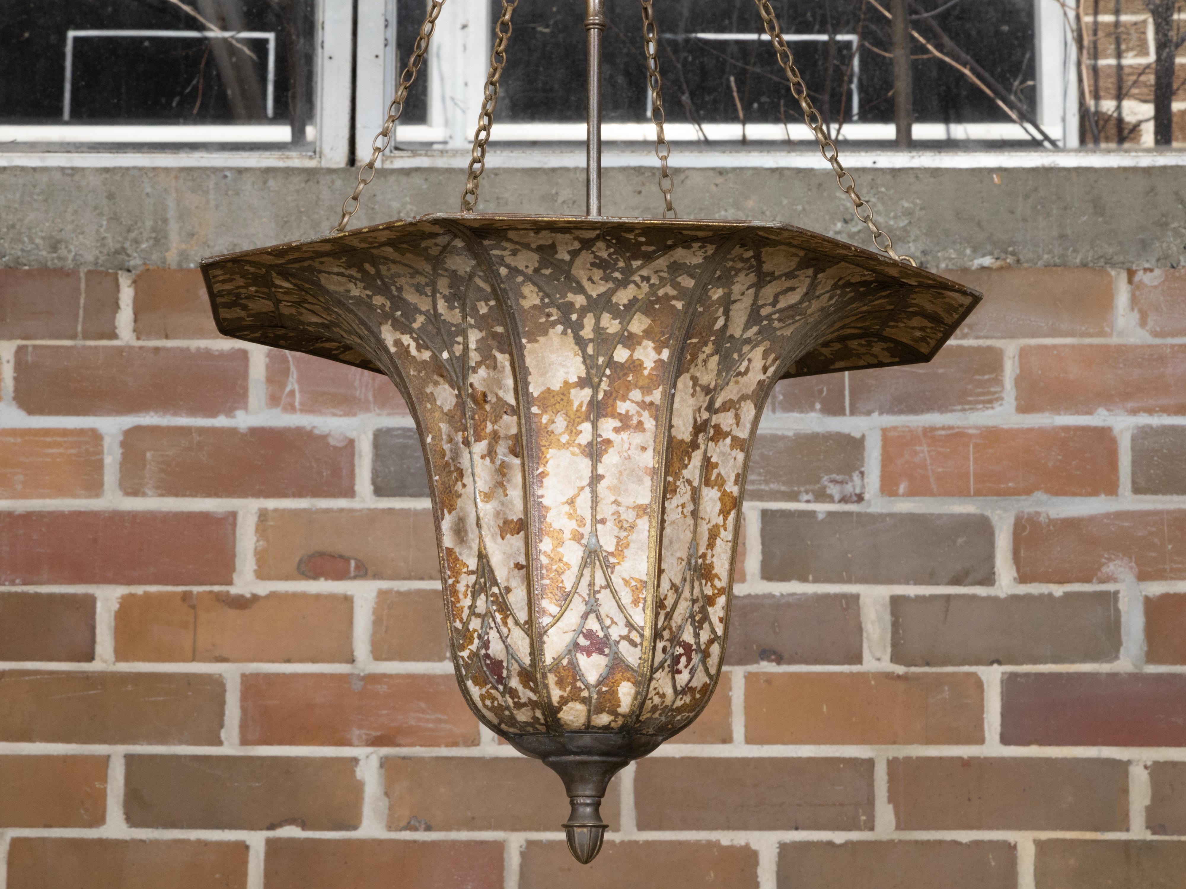 An Art Deco period floral-shaped light fixture from circa 1920 with textured finish. This exquisite Art Deco period floral-shaped light fixture from circa 1920 captivates with its elegant and organic design, reminiscent of a daffodil corona. The