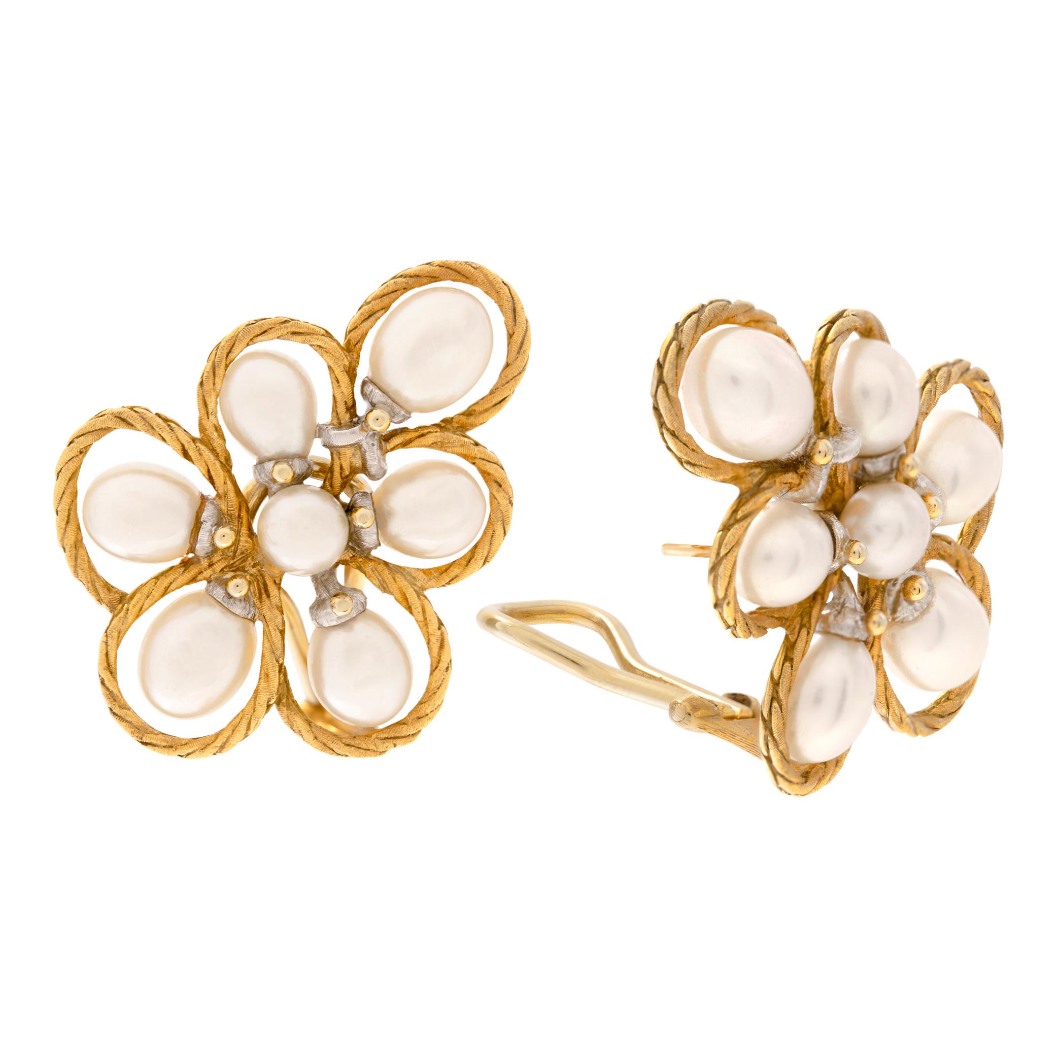 Floral style 18k yellow and white gold twisted rope framed pearl earings with omega clip backs. Measure 35mm x 27mm.
