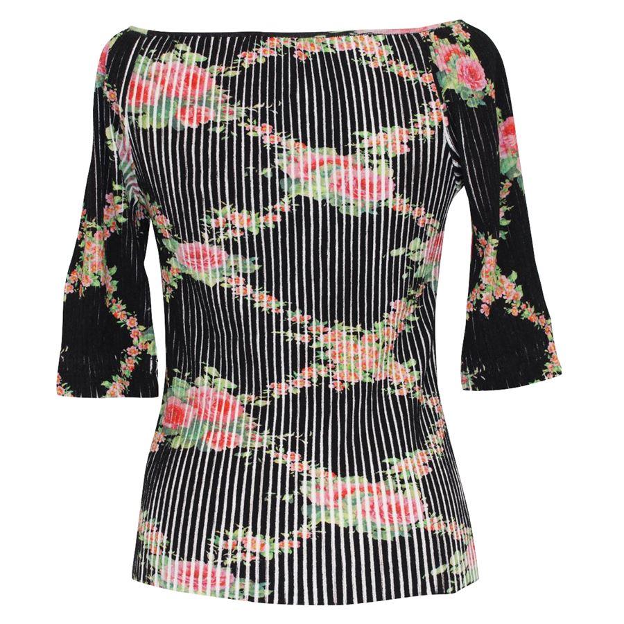 Viscose and elathane Black color Floral multicolored print Short sleeves Shoulder / hem length cm 56 (22 inches) Shoulder width cm 46 (18.1 inches) Original price euro 569
