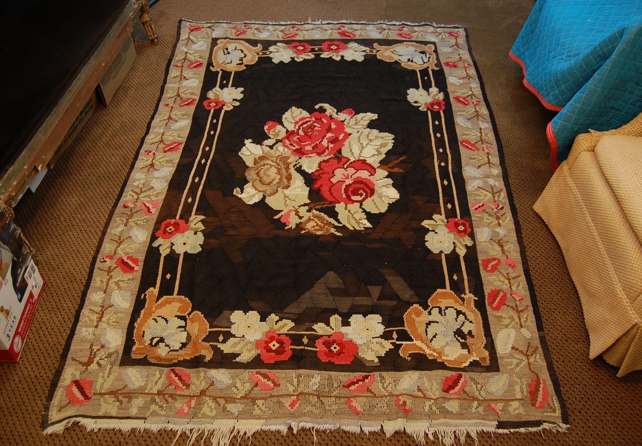 Antique Bessarabian area rug in flat-weave, the colors are all very bright (on both sides) and the weave is in excellent condition. This rug is reversible and very durable.