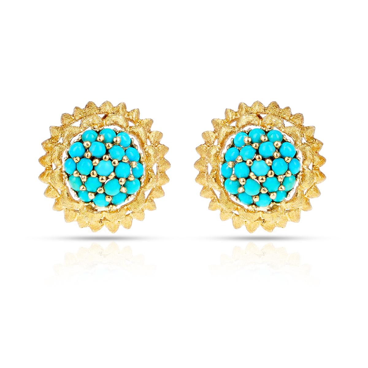 A beautiful pair of Floral Earrings with a cluster of Turquoise Cabochons in the center. The earrings are made in 14 Karat Yellow Gold. 