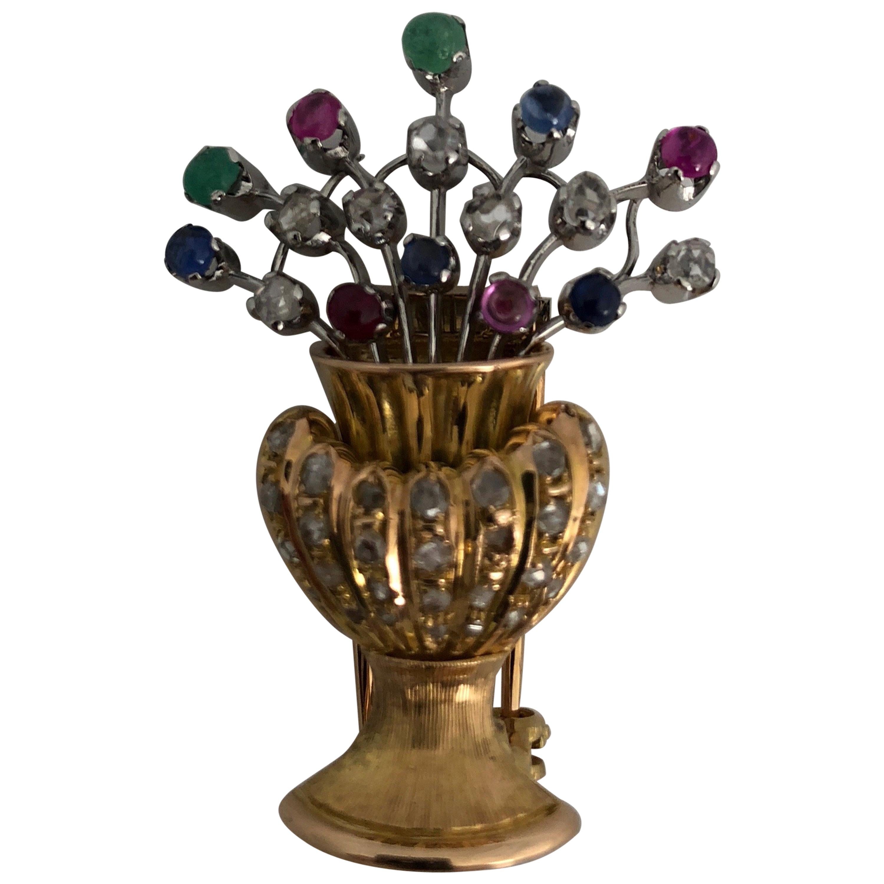 Blumenvasenbrosche aus Gelbgold und Edelsteinen