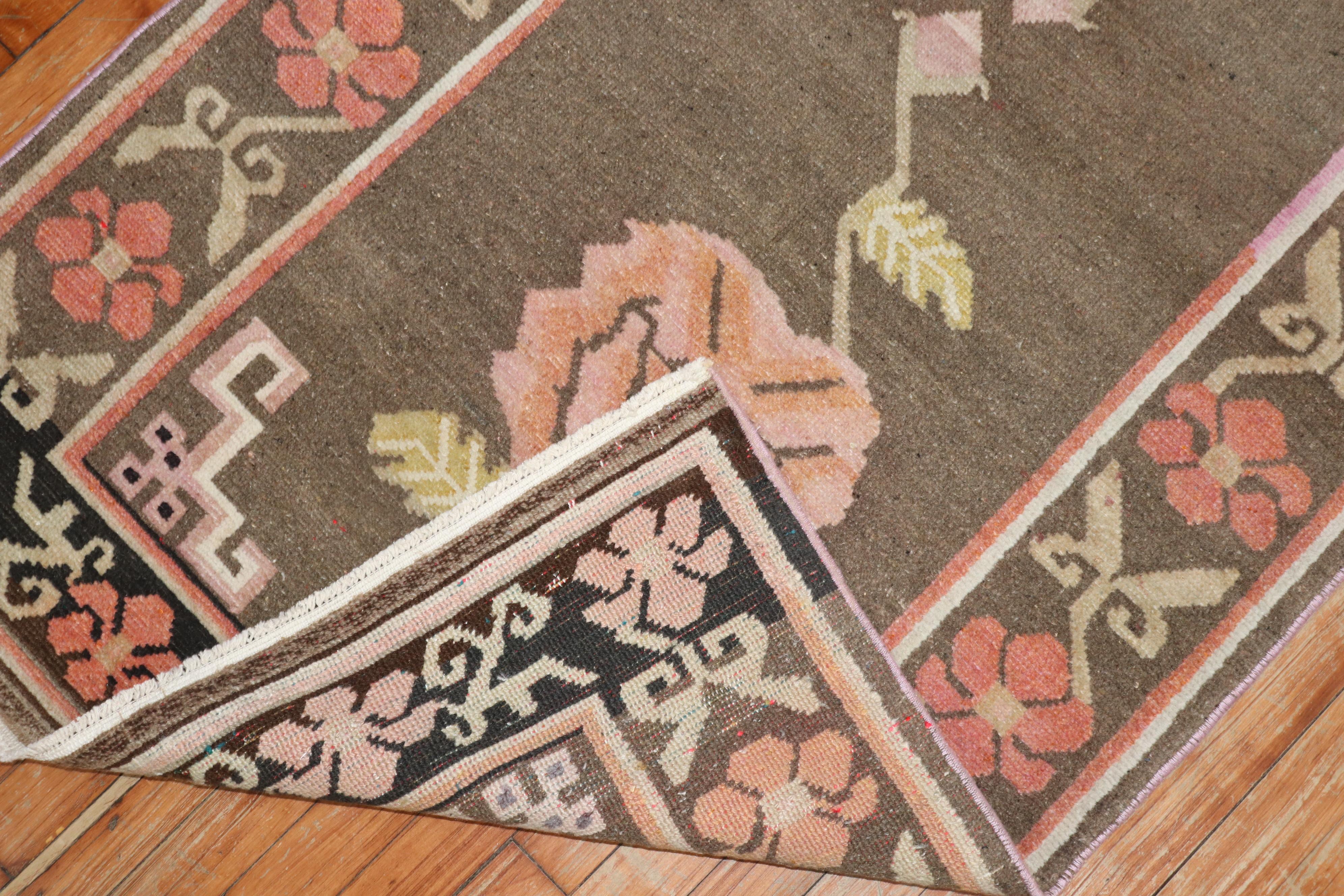 A floral one-of-a-kind Tibetan rug from the middle of the 20th century 

Measures: 3'1'' x 6'.