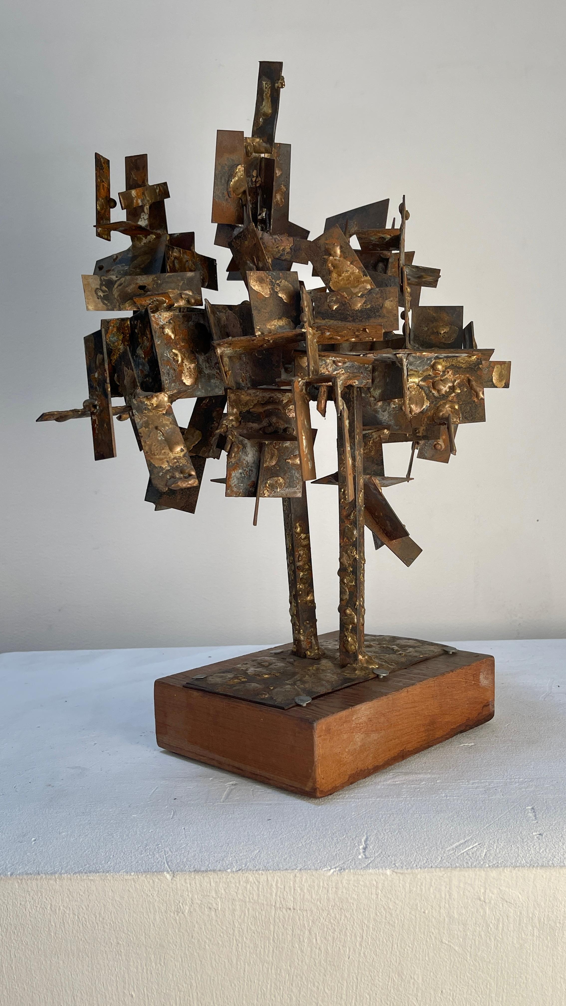 Florence Arnold (American, 1900-1994) brutalist welded metal sculpture (1960s) with walnut base.
    
