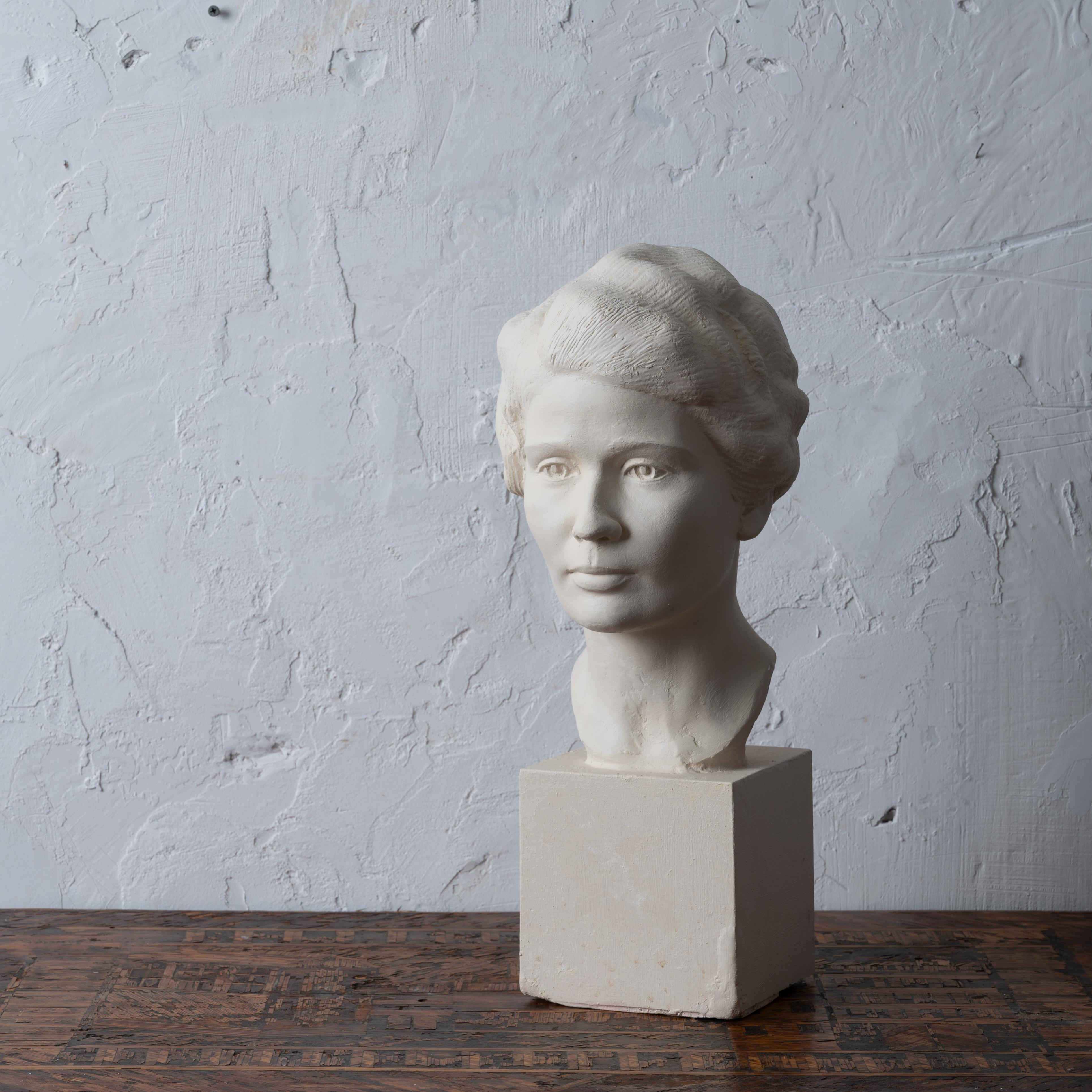 Rosario Russell Fiore
(American, 1908-1994)

A plaster bust of Florence Reeve Fiore, wife of the artist, circa 1930s.
Unsigned.

8 ½ inches wide by 9 ½ inches deep by 20 inches tall

Very good overall condition.

Rosario R. Fiore was a prominent