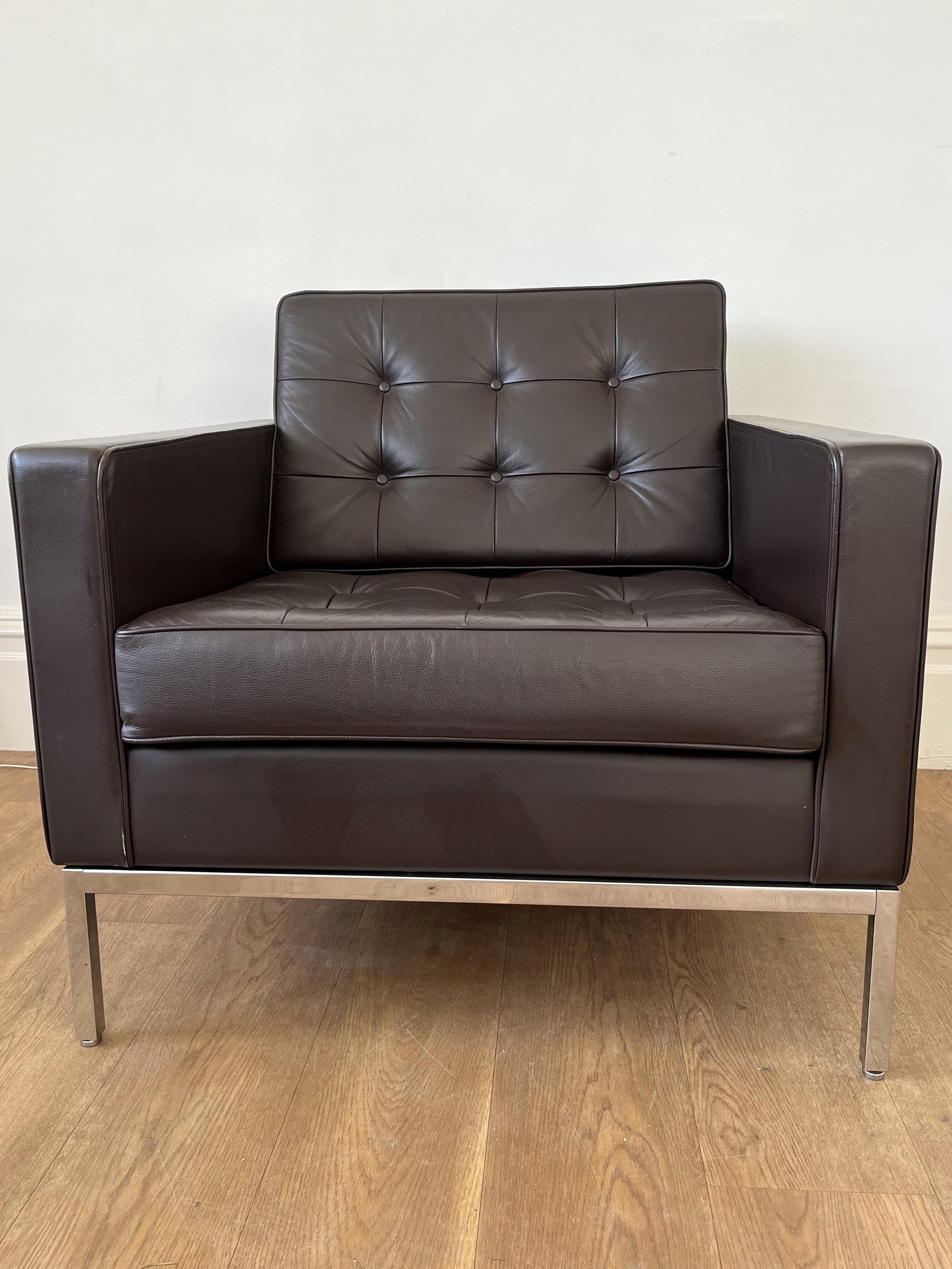 Florence Knoll Armchair for Knoll Studio originally designed in 1954.

The chair features dark brown leather upholstery on a polished chrome base.

The chair is in very good condition showing only very light signs of use.

The Knoll Studio