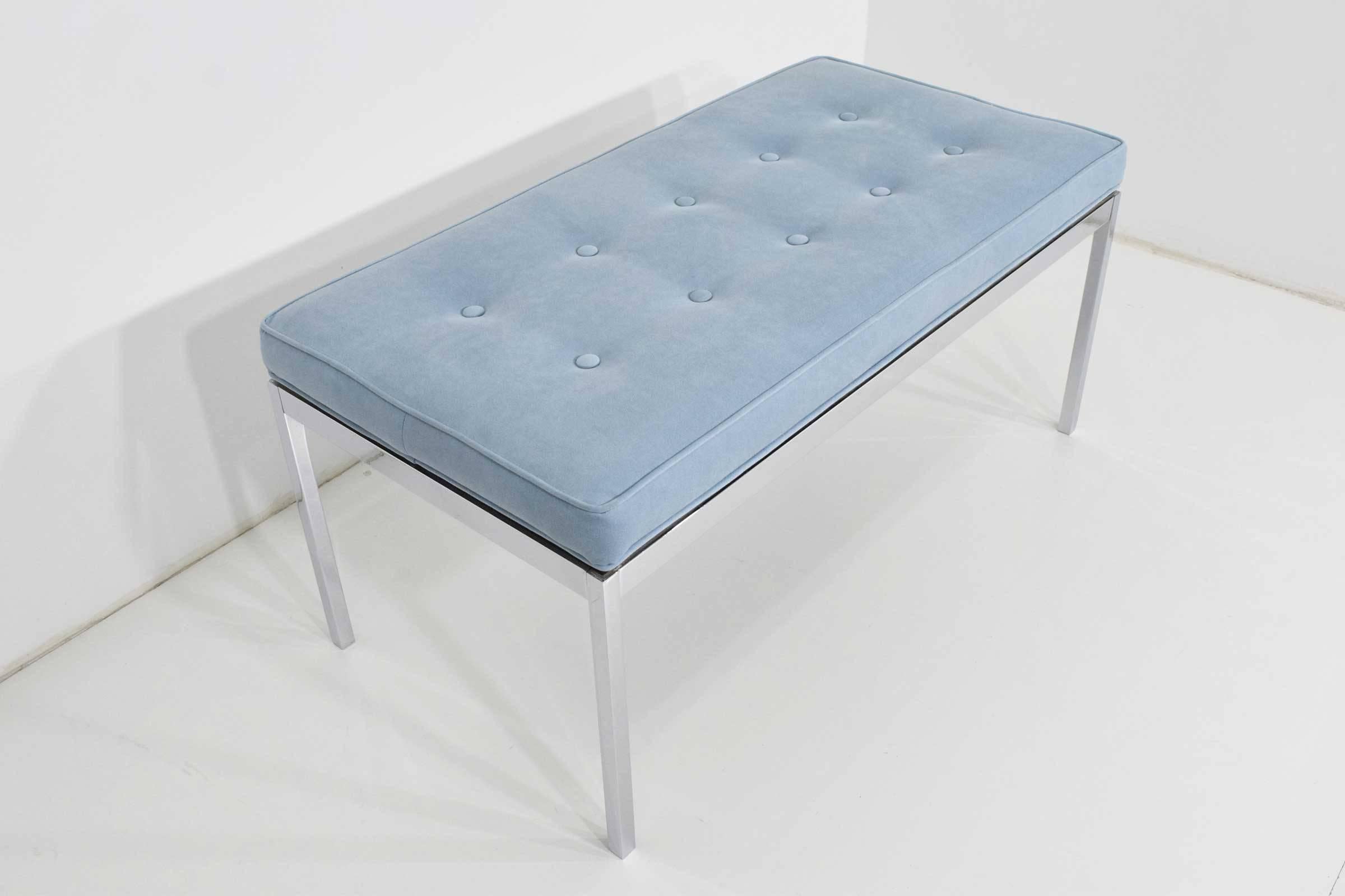 Bench is chrome with button tufted light blue microsuede cushion. We can reupholster if desired.
