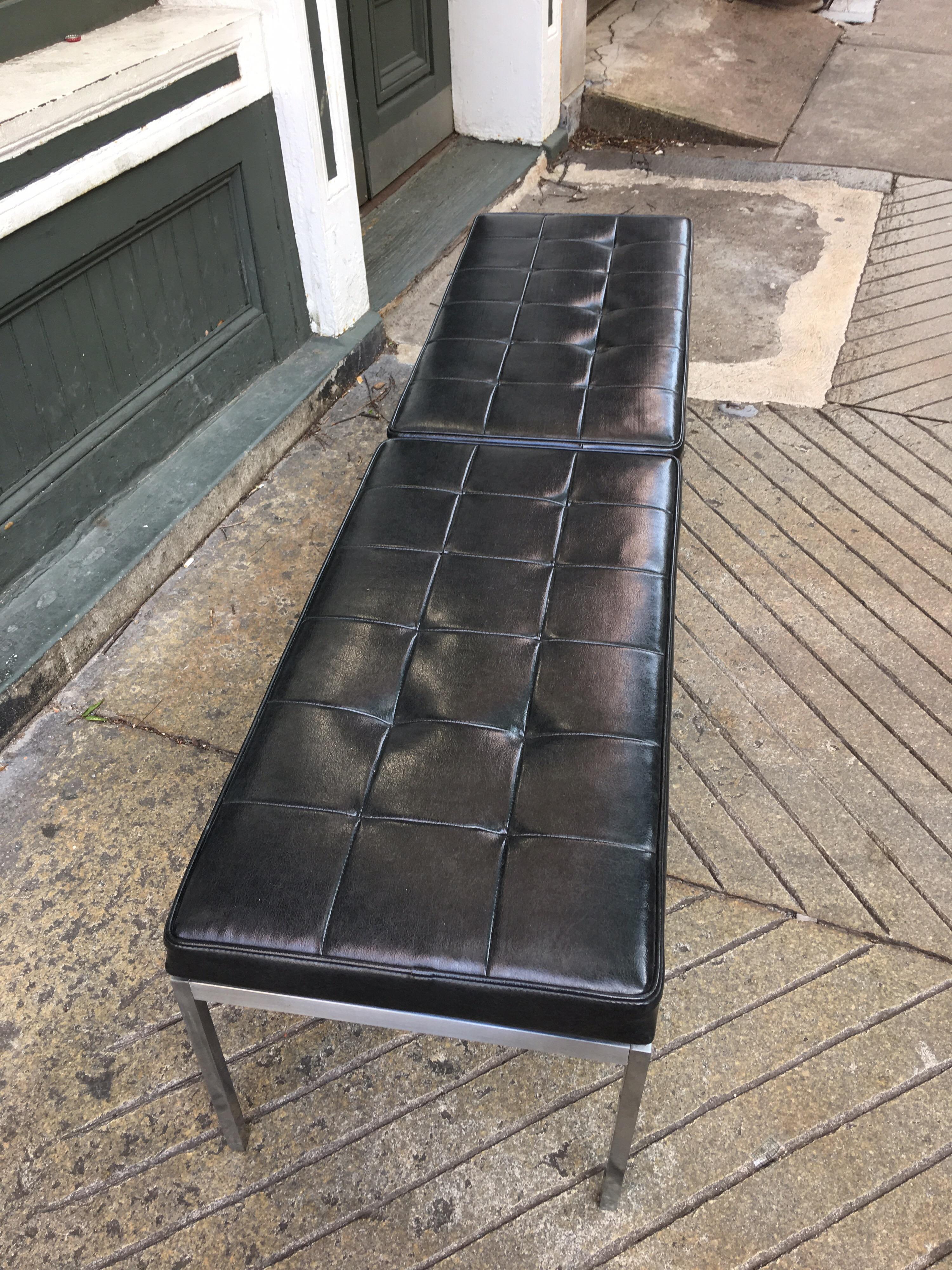 Nice early Florence Knoll bench in black vinyl. Originally from the office of a Cement Company President! Classic design with a stainless steel frame. Original vinyl seat pad shows one small tear as shown in photo.