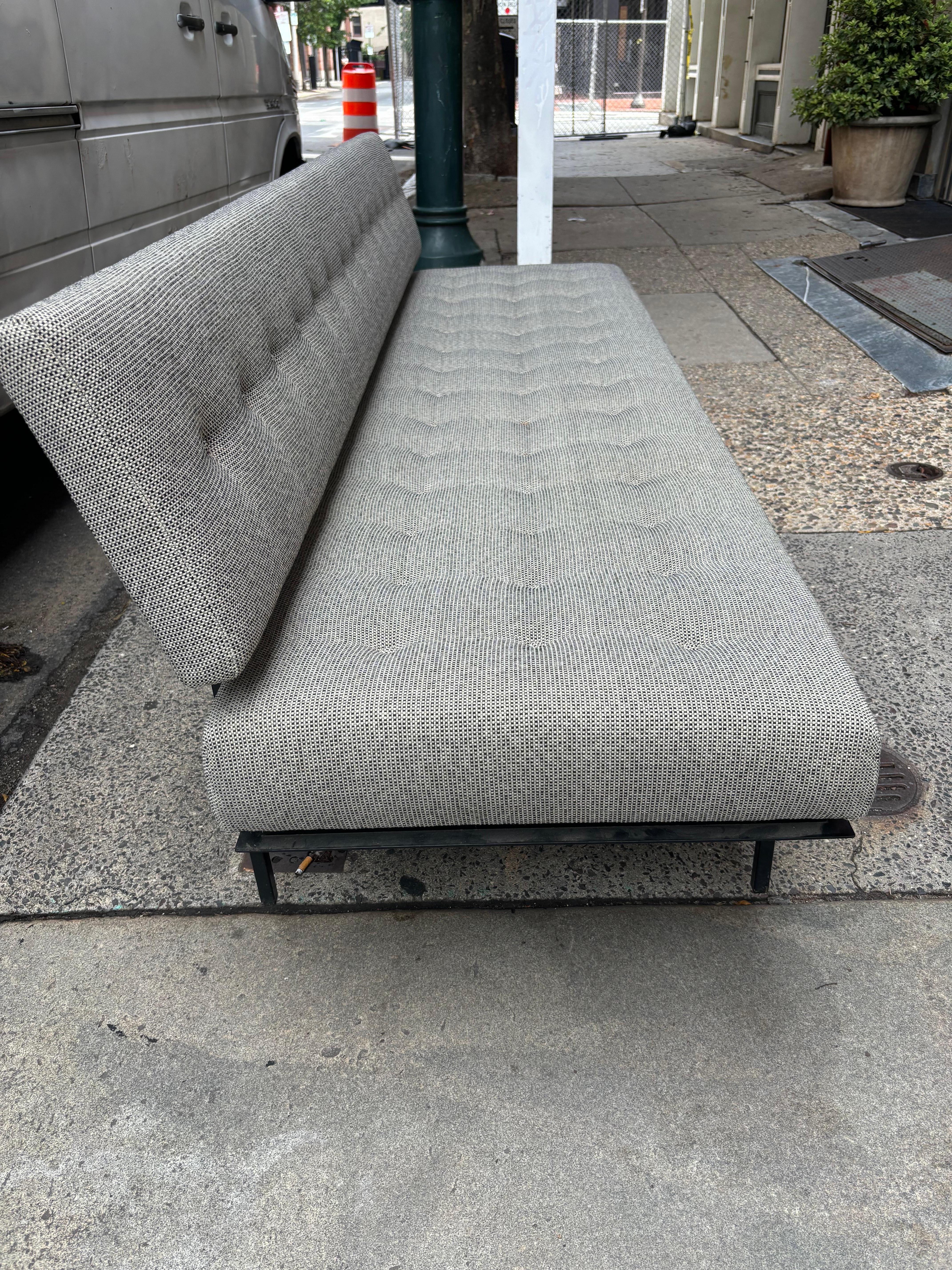 Florence Knoll Bench Style Sofa, model 578.  Perfect to use as a guest bed when people stay over!  Sold this sofa to a customer 20 plus years ago, they reupholstered it then!  Still looks really good with fabric made up of grays, whites and blacks. 