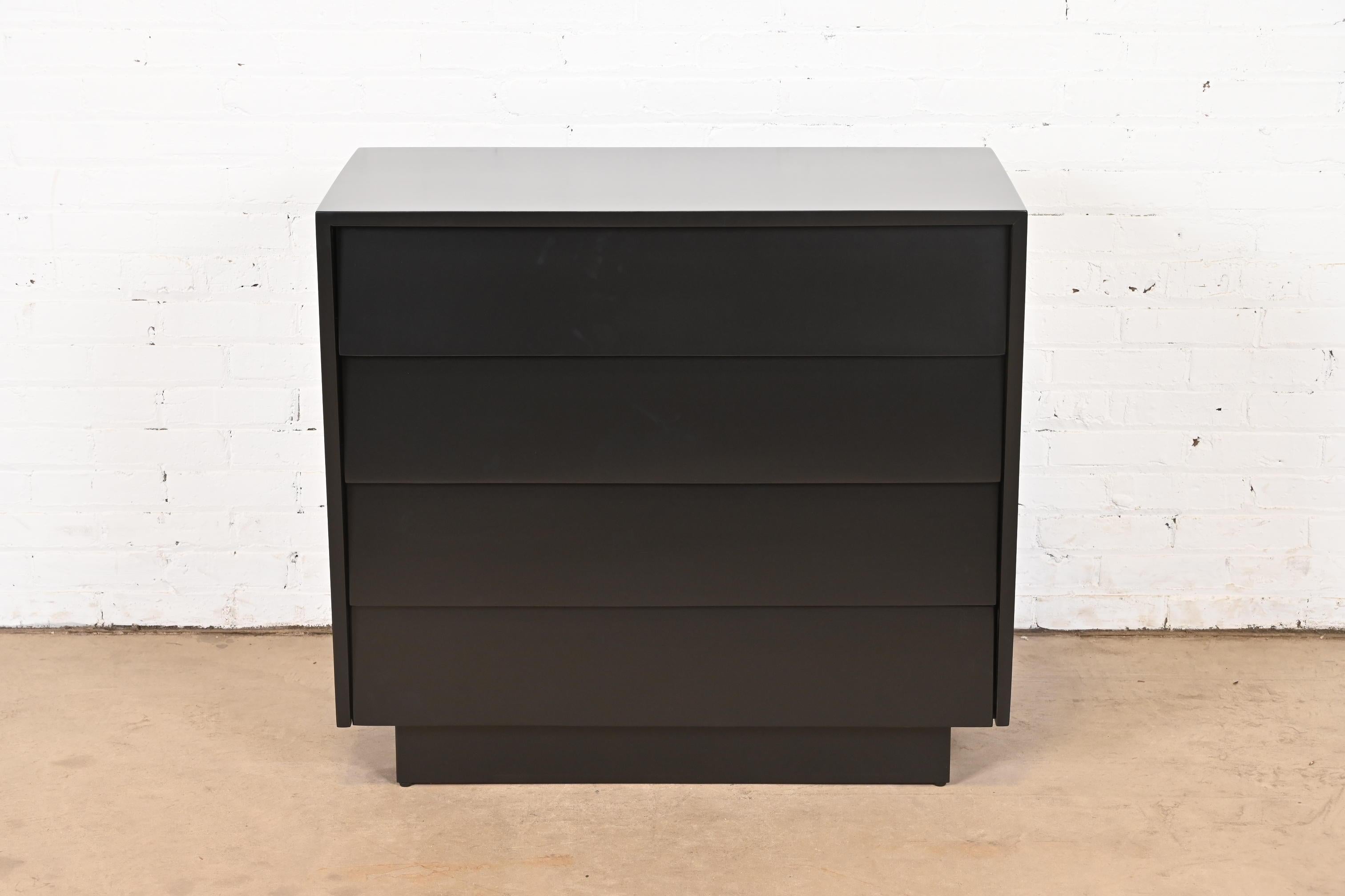 An exceptional Mid-Century Modern four-drawer dresser, bachelor chest, or bedside chest

By Florence Knoll for Knoll Associates

USA, Circa 1950s

Black lacquered walnut, with louvered front drawers.

Measures: 36