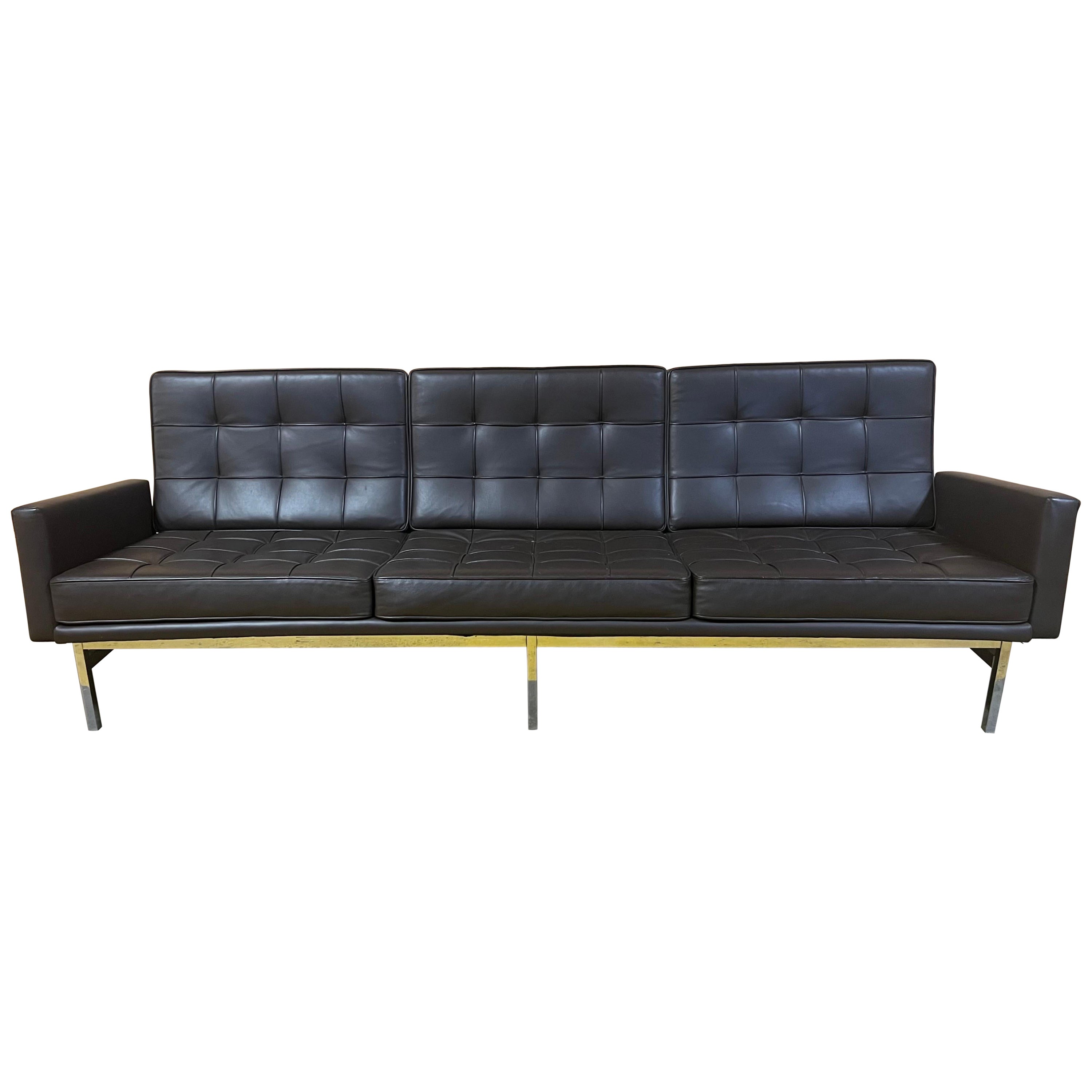 Florence Knoll three seat sofa by Knoll Associates. Model 2577. Original Naugahyde brown upholstery with chrome-plated steel base.

Unsigned.

USA, circa 1960-1970.

Dimensions: 90.75” L x 27” D x 29.5” H

Provenance: Private Collection, East Coast,