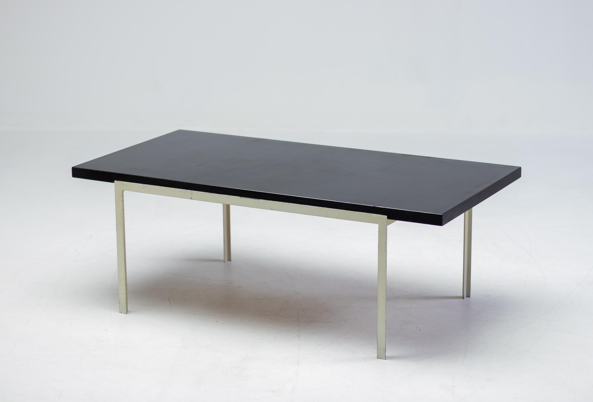 Florence Knoll for Knoll International coffee table in white enameled steel and black laminate.
Signed with decal manufacturer's label to underside.

Literature: Knoll Furniture: 1938-1960, Rouland and Rouland, pg. 110.

Florence Knoll, a pioneering
