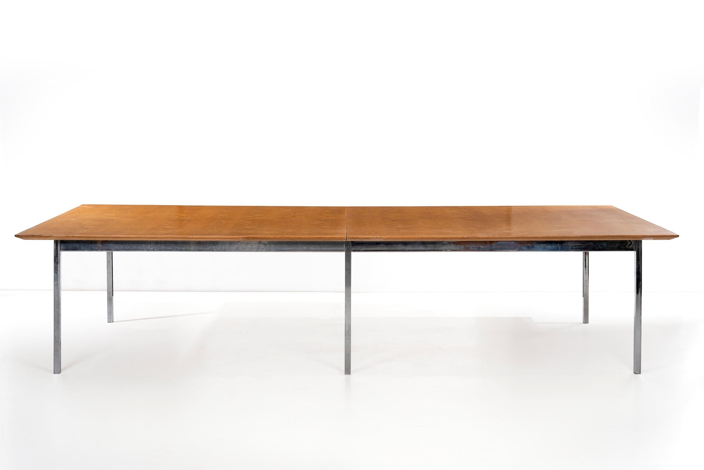 Florence Knoll for Knoll, custom ordered for standard oil in Los Angeles large-scale table, features book-matched bleached oak veneer with classic Knoll beveled edge, square tubular base structure.
Knoll label on underside.