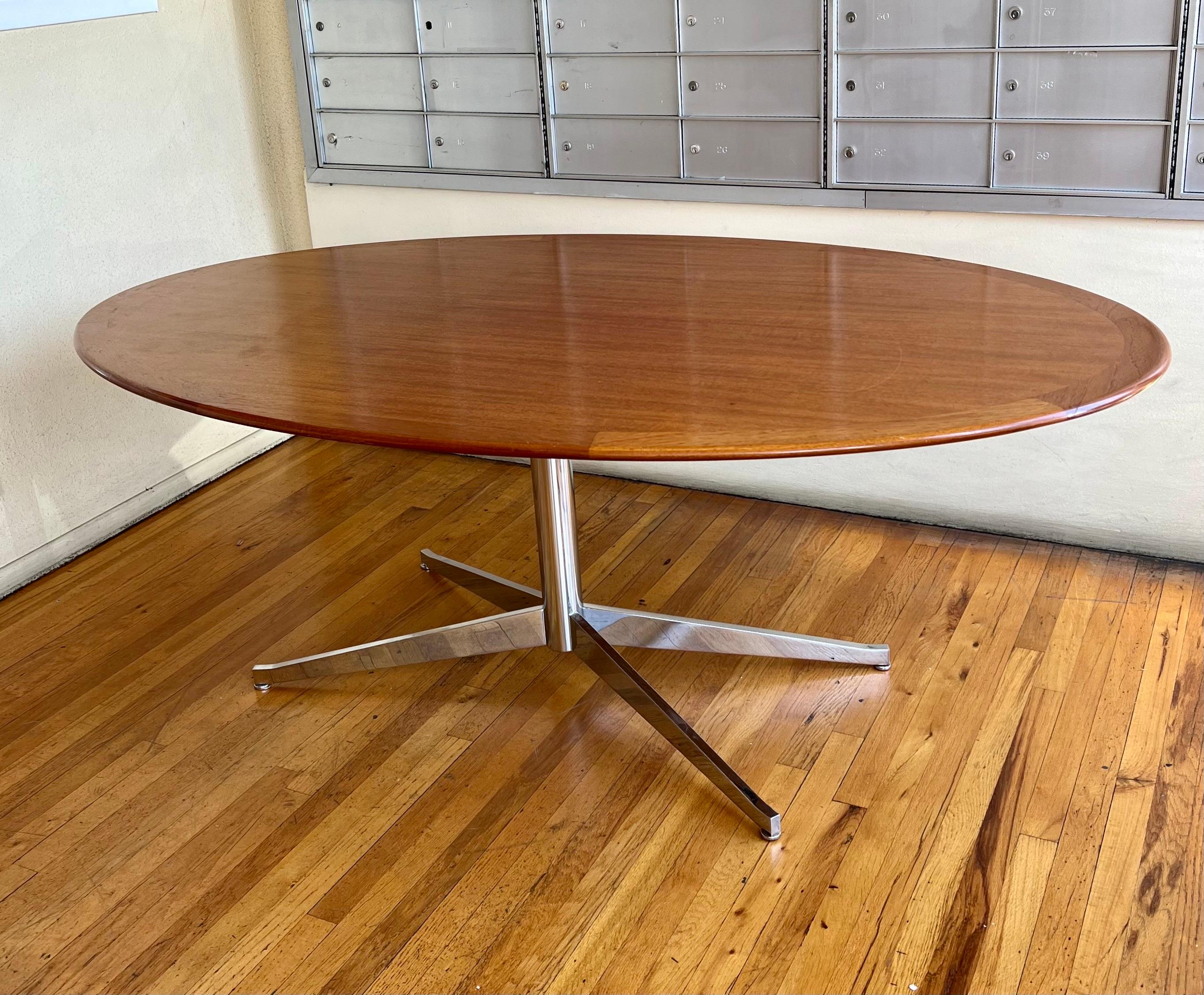 Knoll conference table circa 1970s great design can be used like a dining table or desk table, some wear due to age please check the pictures. With original walnut edge top and chrome-plated base.