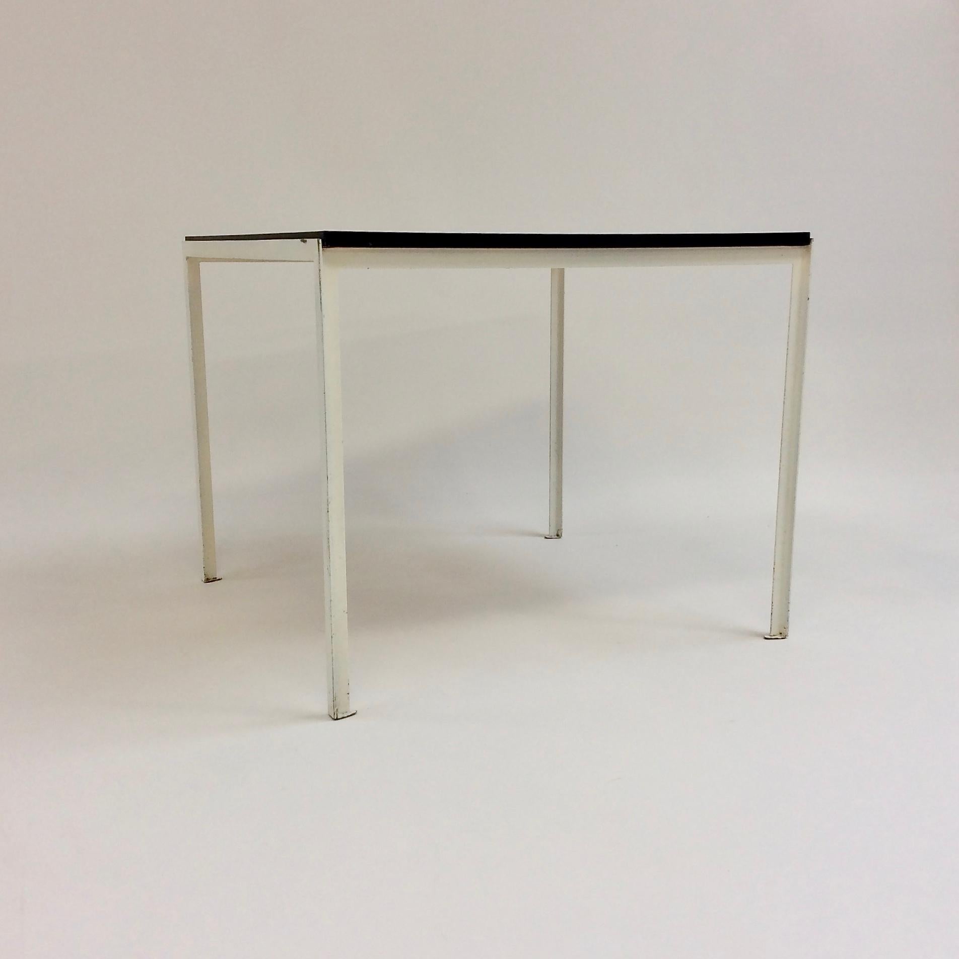 Florence Knoll dining table for Knoll International, circa 1950.
Original black laminate top on original white lacquered metal structure.
Dimensions: 87 cm W, 87 cm D, 72 cm H.
All purchases are covered by our Buyer Protection Guarantee.
This