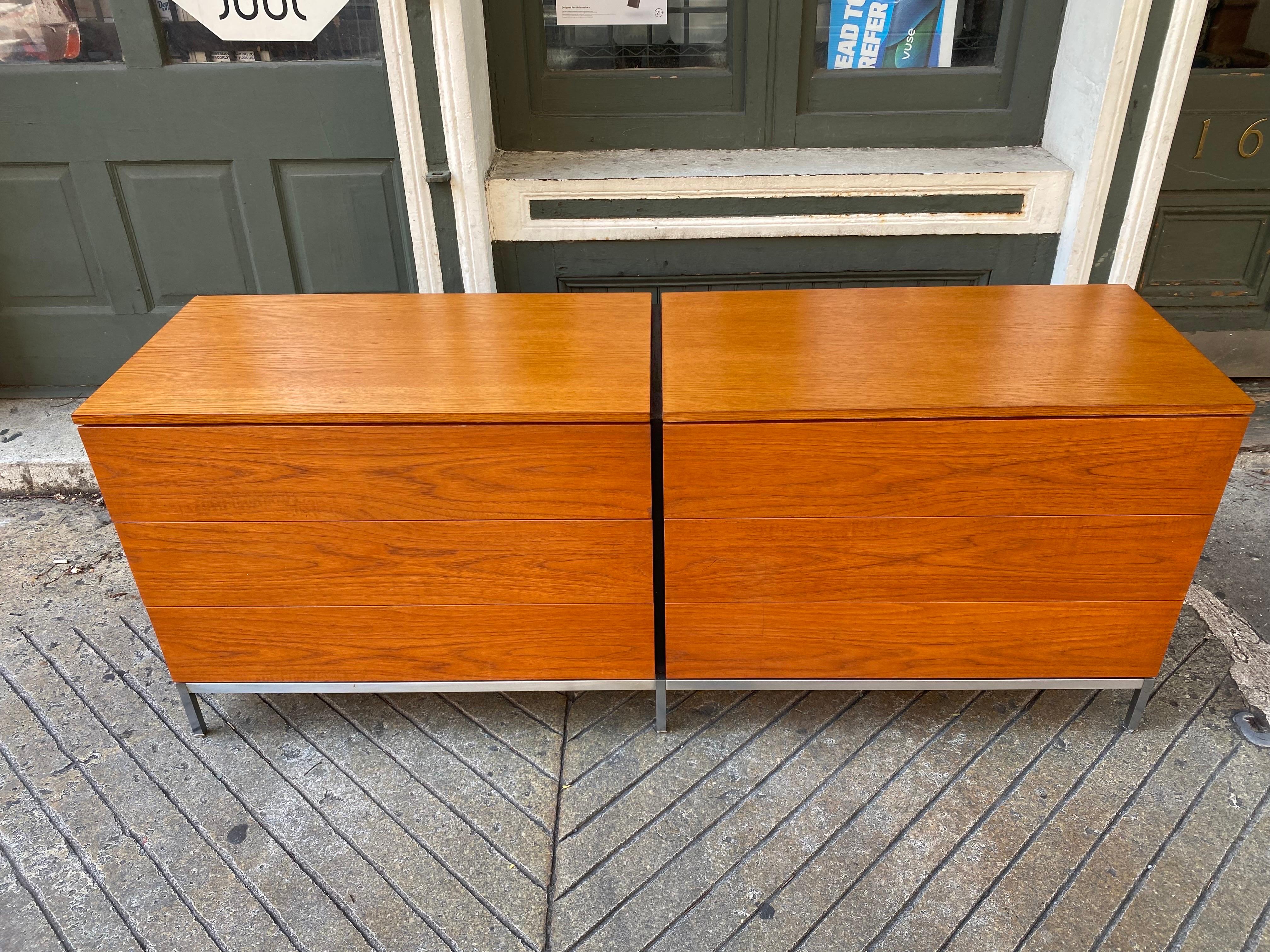 Florence Knoll for Knoll Double Teak Dresser on chrome stainless steel base with adjustable feet.  Top newly refinished, entire cabinet cleaned and oiled.  Drawers retain white drawer divides.  One faint mark on the front of drawers in one area as