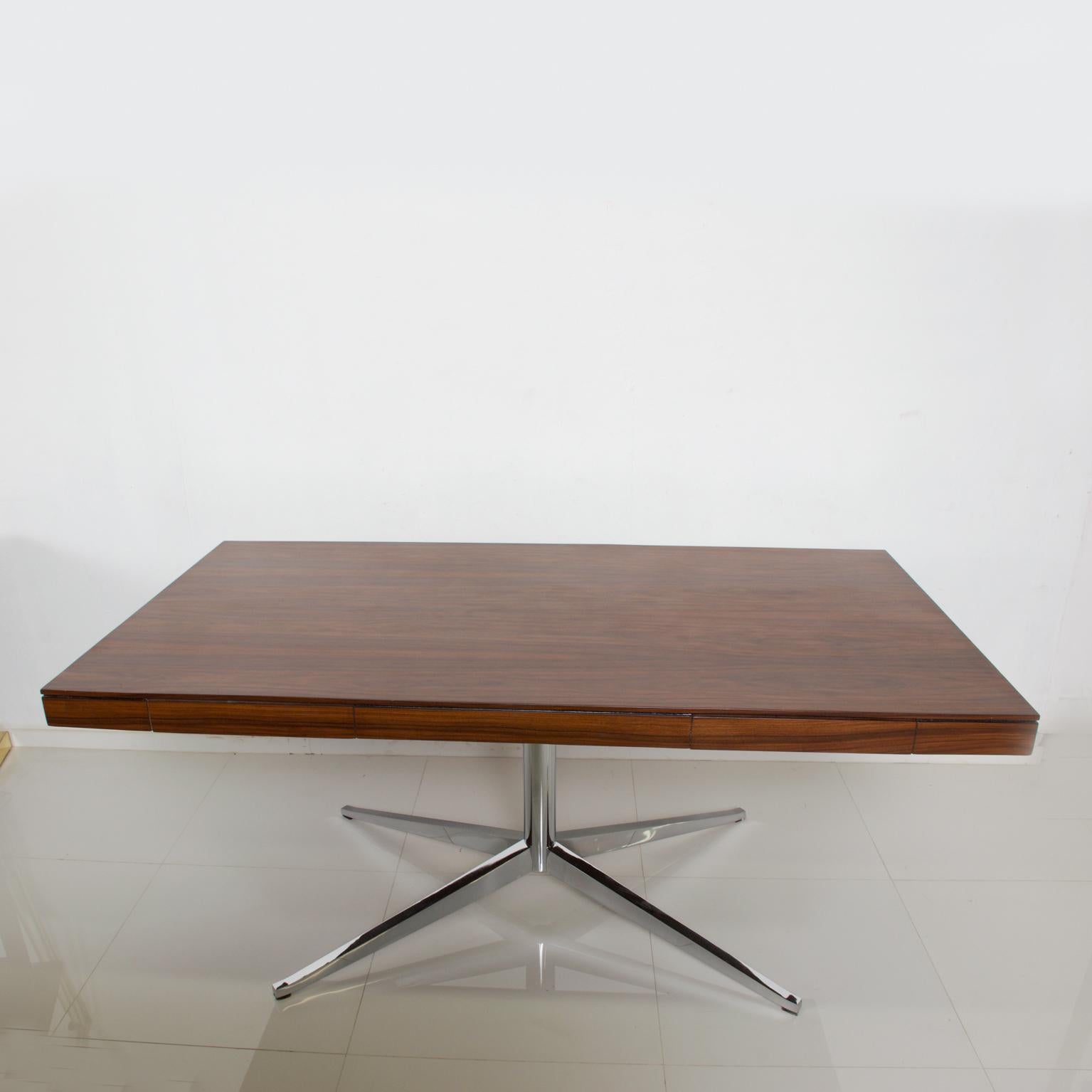 For consideration: Florence Knoll Rosewood Partners Desk Chrome Plated Legs Mid Century Modern

Designed in Rosewood with Chrome plated legs. Fabulous classic Knoll design.

Dimensions: 63 3/4
