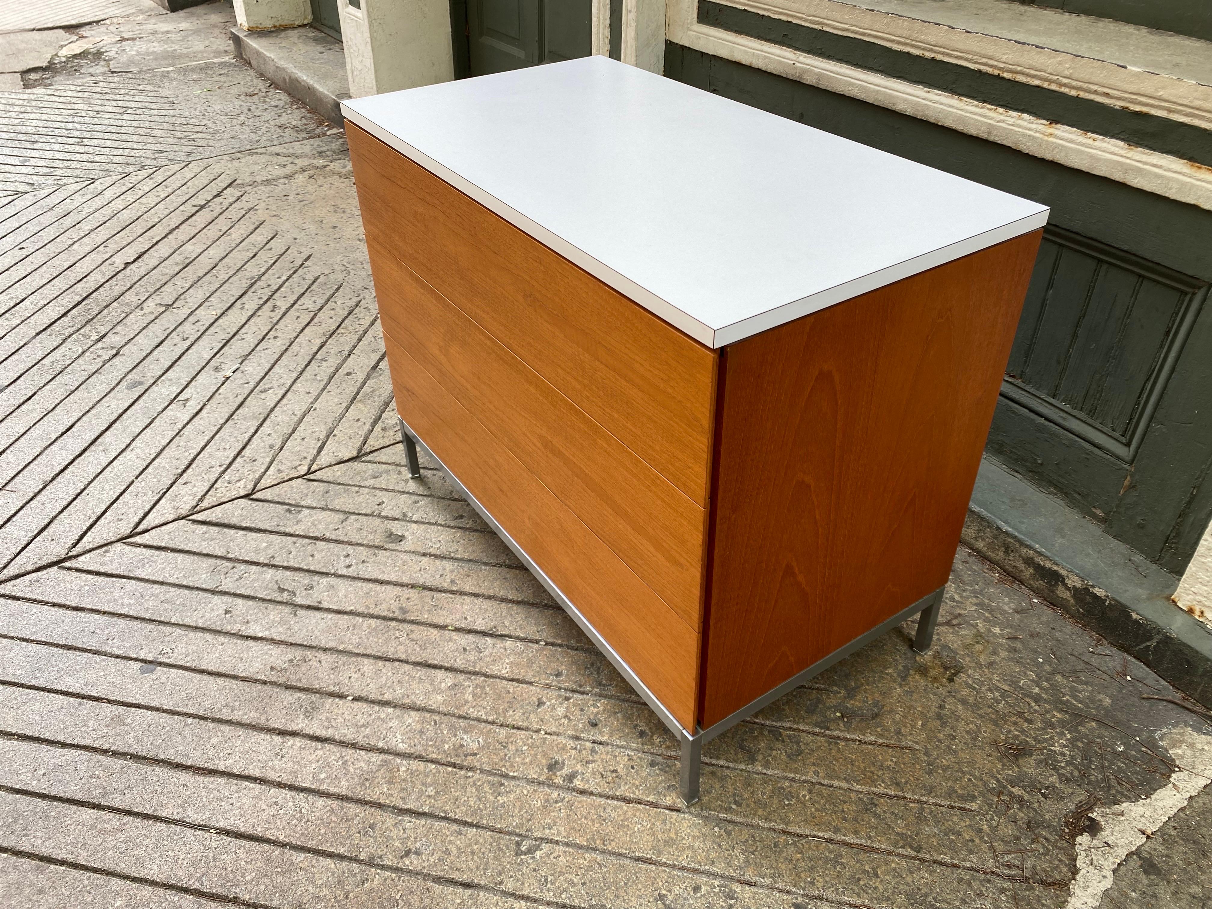Florence Knoll for Knoll 3 Drawer Dresser that sits on a Satin Chrome Base with adjustable feet to level out cabinet easily. Three pull out drawers with recessed pulls on each end. Clean simple lines! Not often seen with white formica tops! Simple