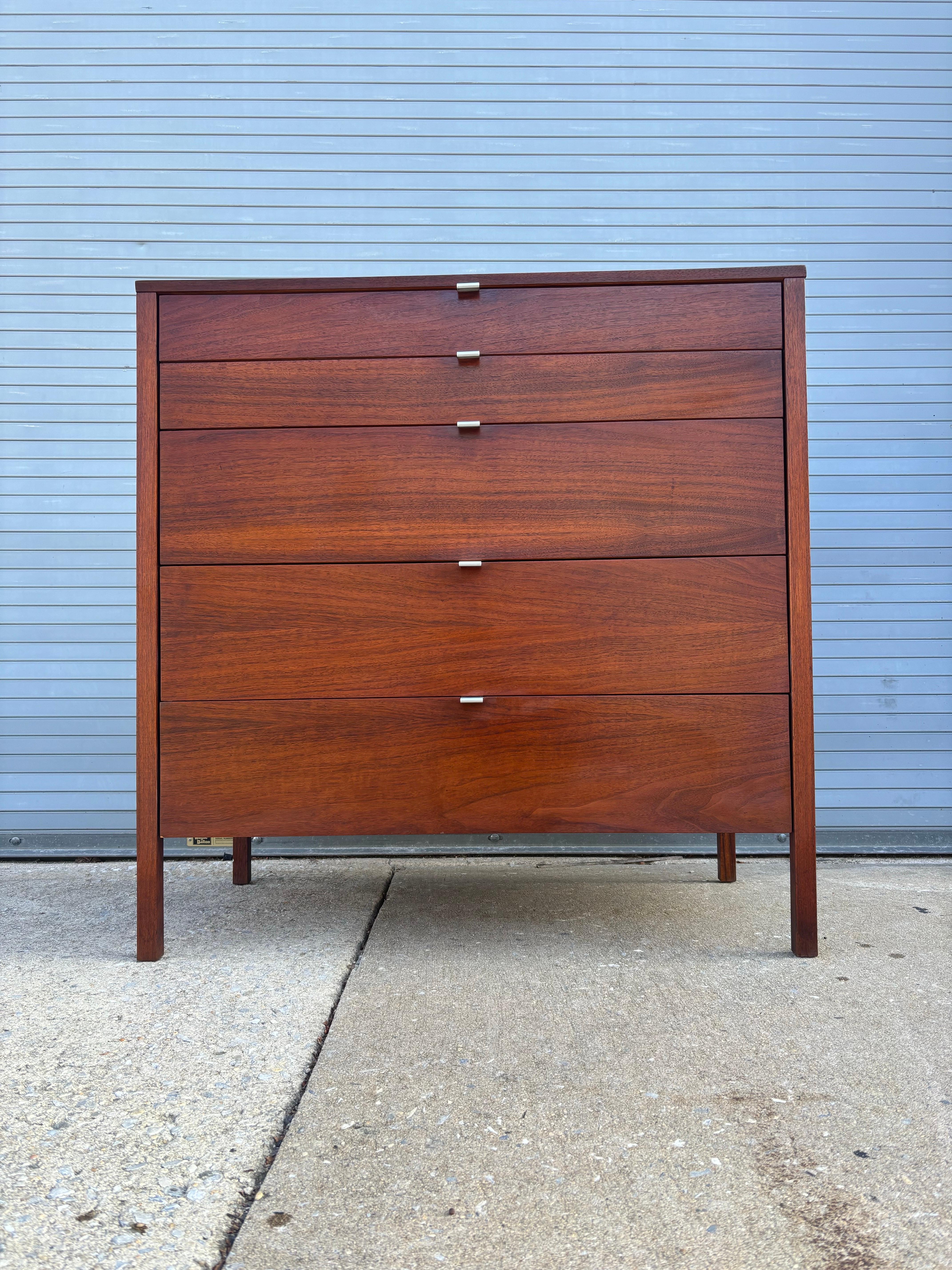 Florence Knoll for Knoll Model#326-2 5 drawer walnut dresser.  Beautiful all original condition!  Faint ring mark on top surface as seen in photo.  Overall very clean!  All drawers work nicely and Dresser is very solid!