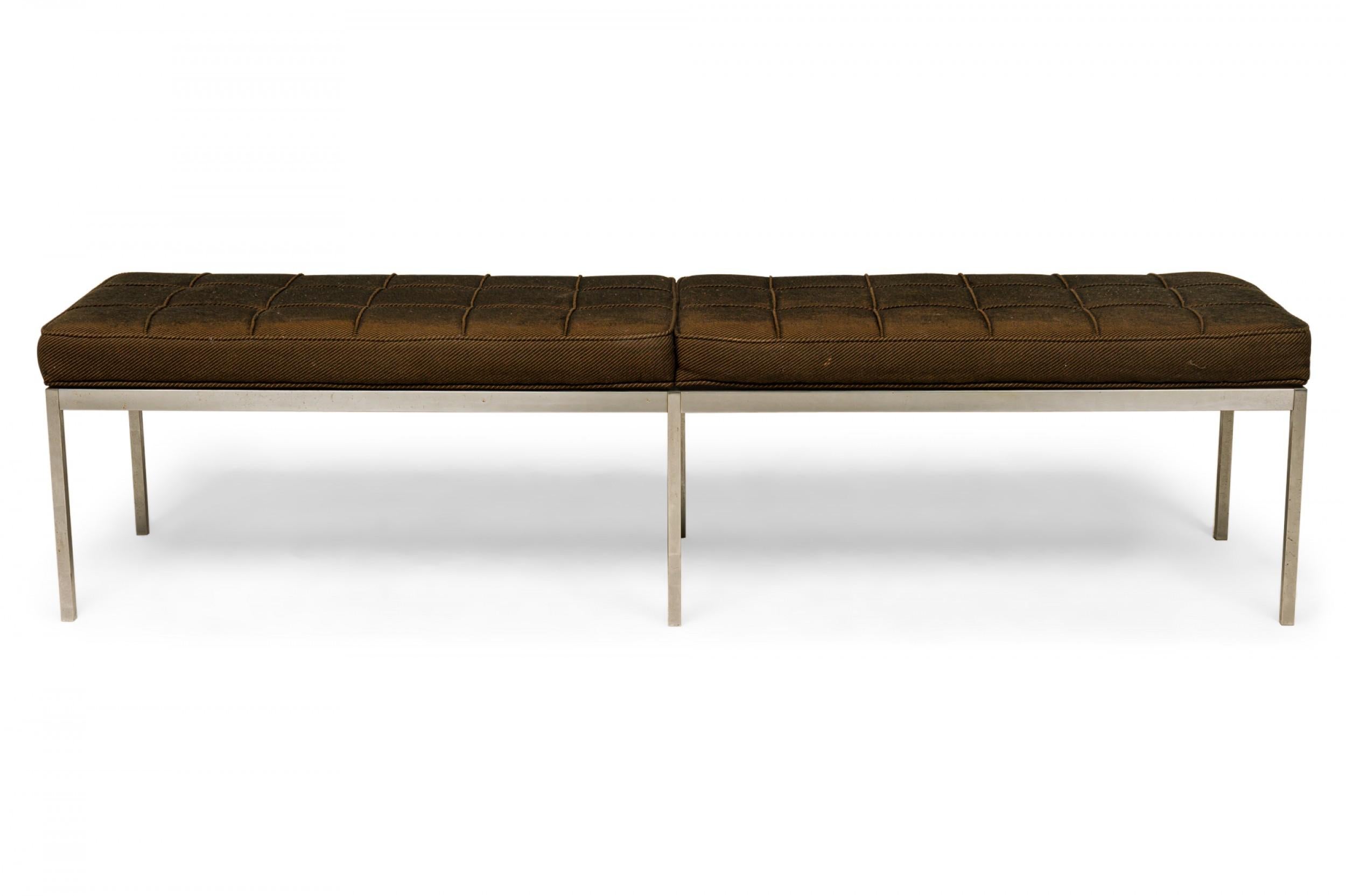 American Mid-Century rectangular museum bench with a brown fabric upholstered square channeled seat resting on a square chrome tube frame. (FLORENCE KNOLL FOR KNOLL INTERNATIONAL).
 