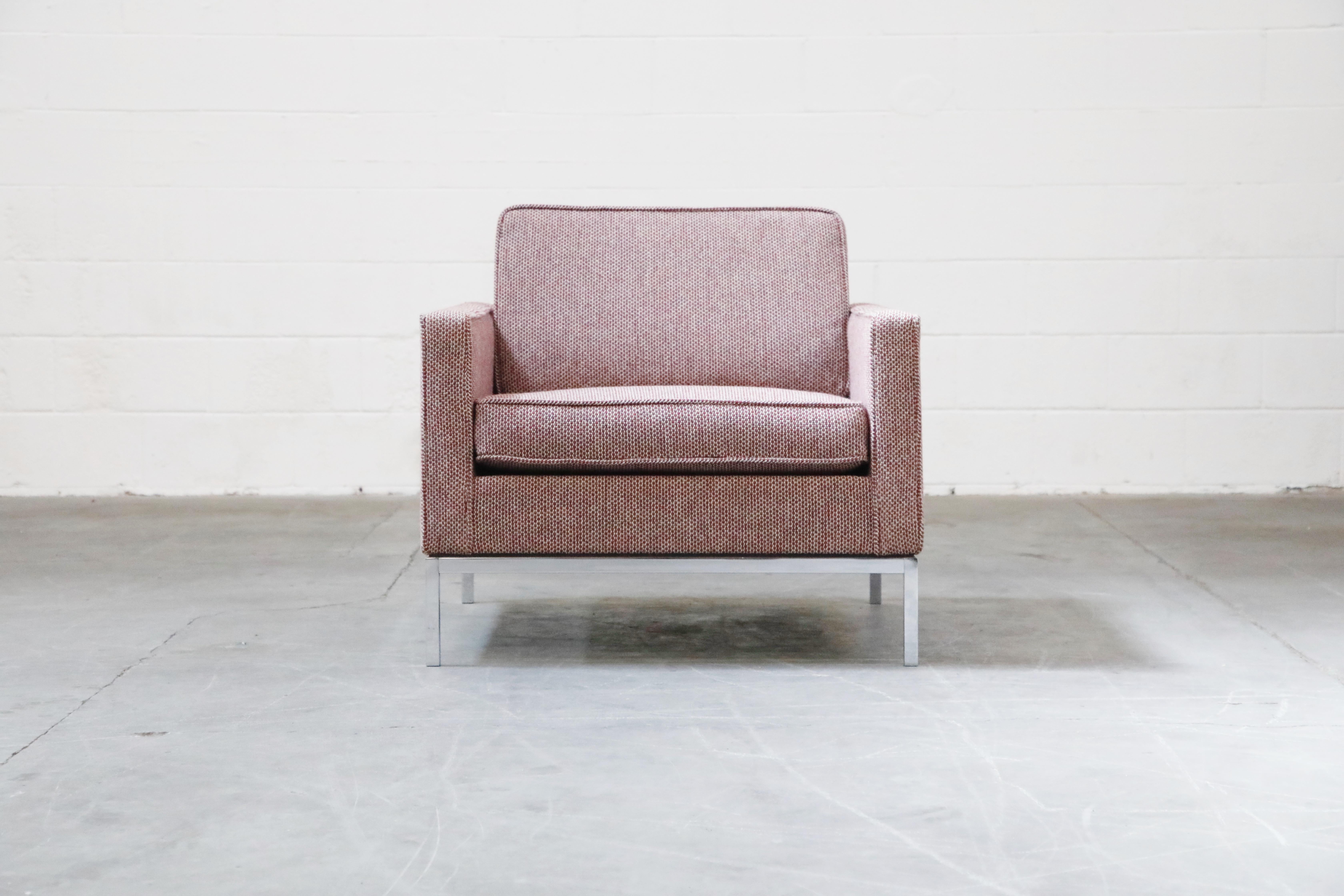 A beautiful Florence Knoll lounge armchair with chrome base and a burgundy and grey tweed fabric. This lovely lounge chair was recently reupholstered and is still in excellent condition with only very light wear. The chair was upholstered without