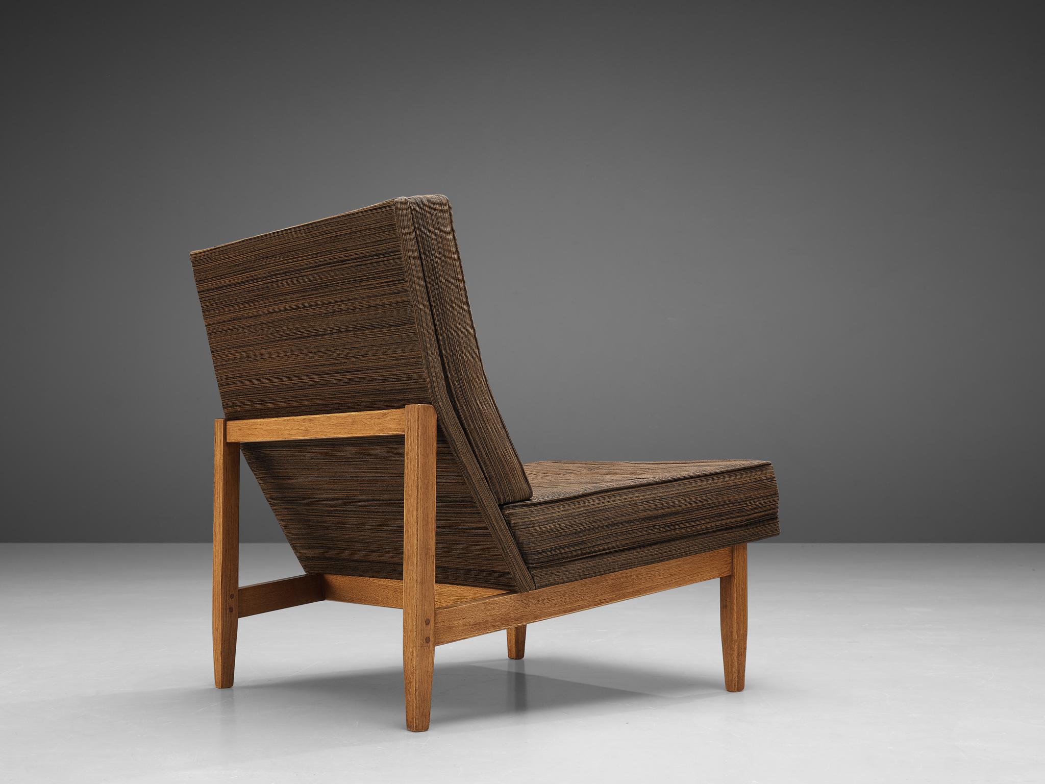 Florence Knoll for Knoll International, lounge chair, model '51', teak, fabric, United States, 1955

This slipper chair model 51 is designed by Florence Knoll. The teak frame of the chair is sleek in form. The angled seat is placed upon the