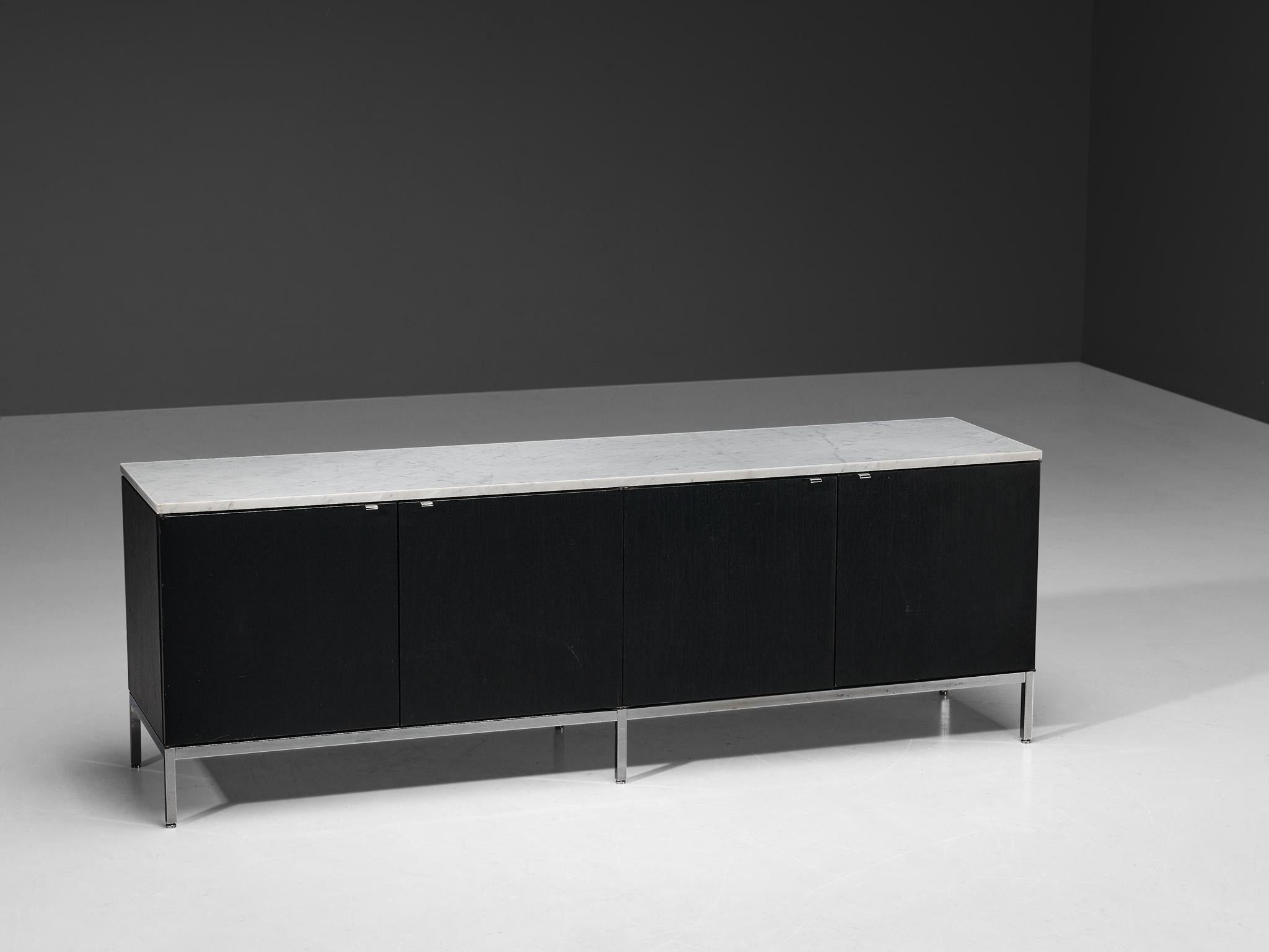 Florence Knoll for Knoll International, sideboard, lacquered oak, metal, Carrara marble, United States, 1960s. 

Credenza with chromed base designed by Florence Knoll for Knoll International. This exceptional and minimalistic designed credenza has